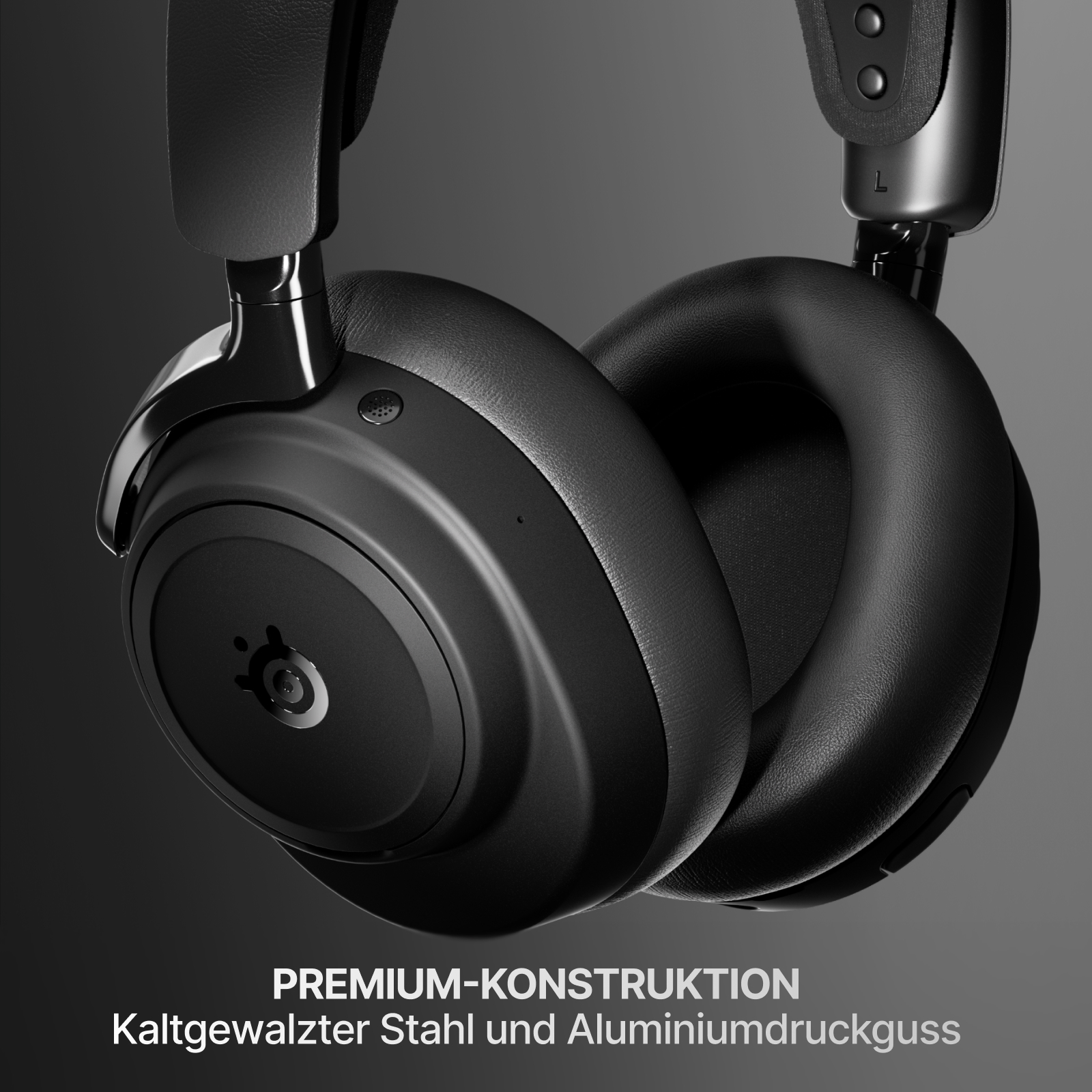 Nahaufnahme von schwarzen Kopfhörern. Die Ohrmuscheln sind rund. Der Text darunter lautet 'PREMIUM-KONSTRUKTION' und 'Kaltgewalzter Stahl und Aluminiumdruckguss'.