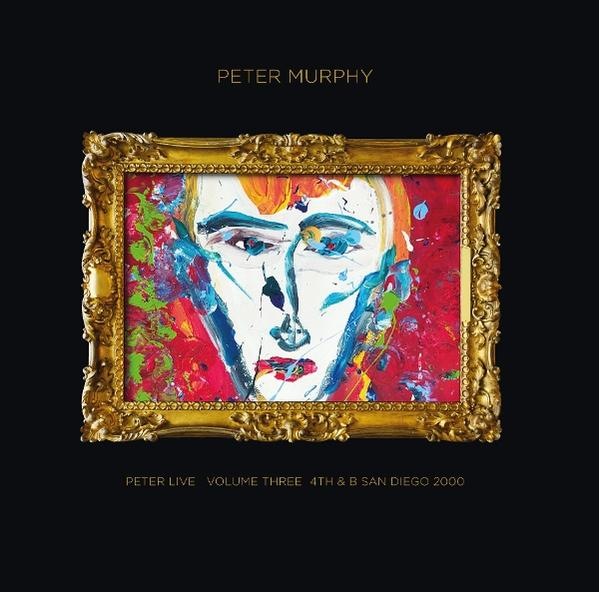 Kunstwerk eines Gesichts mit bunten Strichen in einem goldenen, verzierten Rahmen auf schwarzem Hintergrund. Text oben: Peter Murphy. Unten: Peter Live Volume Three.
