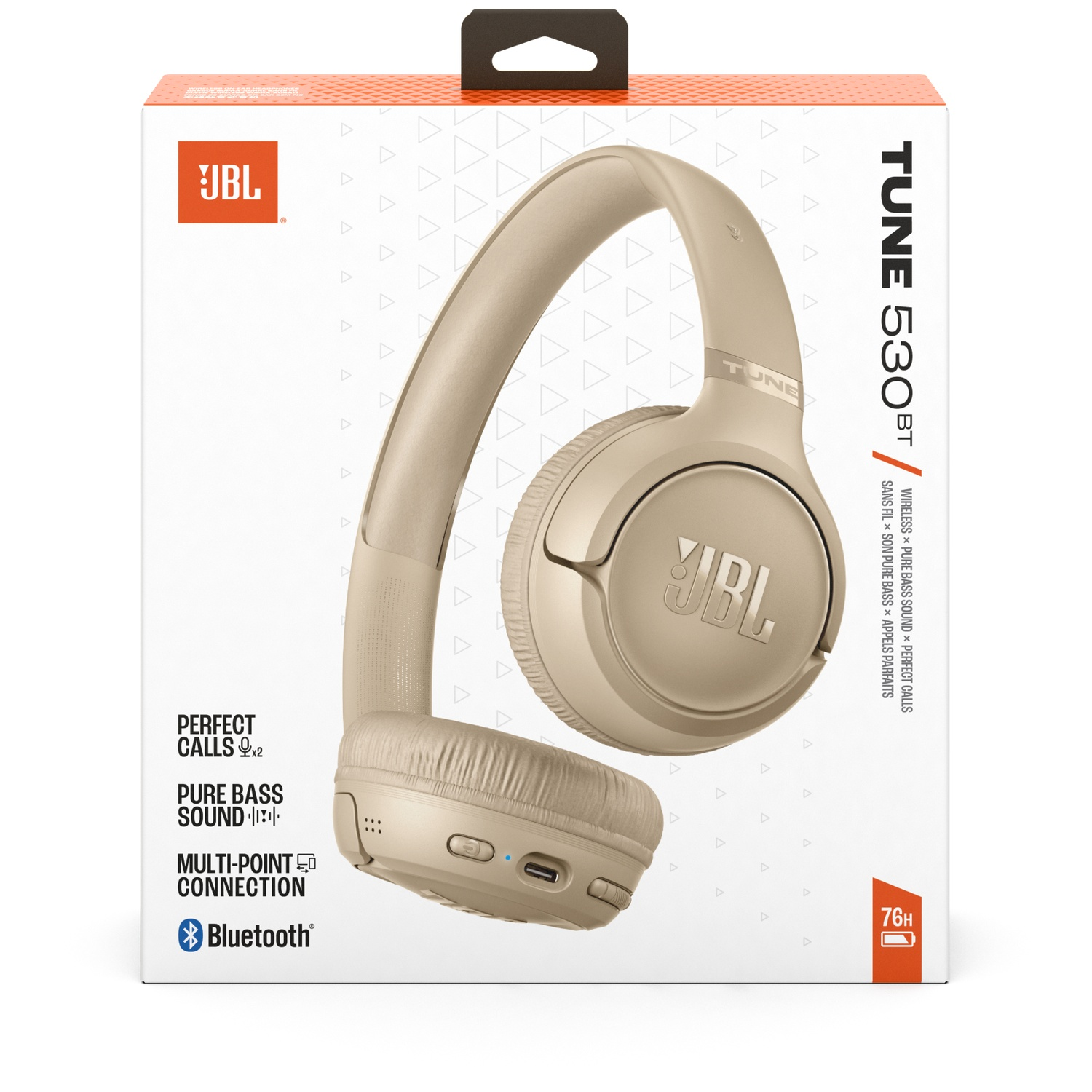 Casque JBL Tune 530BT dans une boîte. Le casque est beige. La boîte est blanche avec des accents orange.