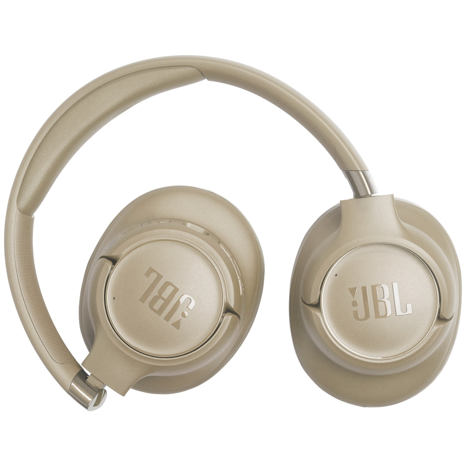 Casque JBL beige sur fond blanc. Le casque est de type circum-auriculaire, plié, avec le logo JBL visible sur les écouteurs.