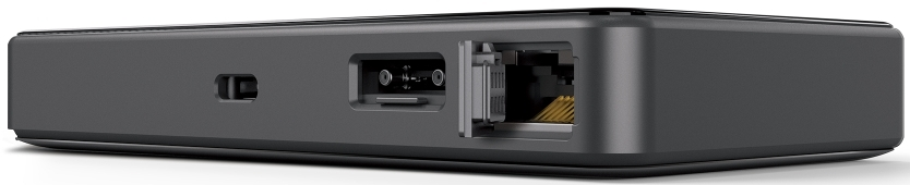Un appareil rectangulaire gris foncé avec des ports visibles, dont un port d'alimentation, un port coaxial et un port Ethernet.
