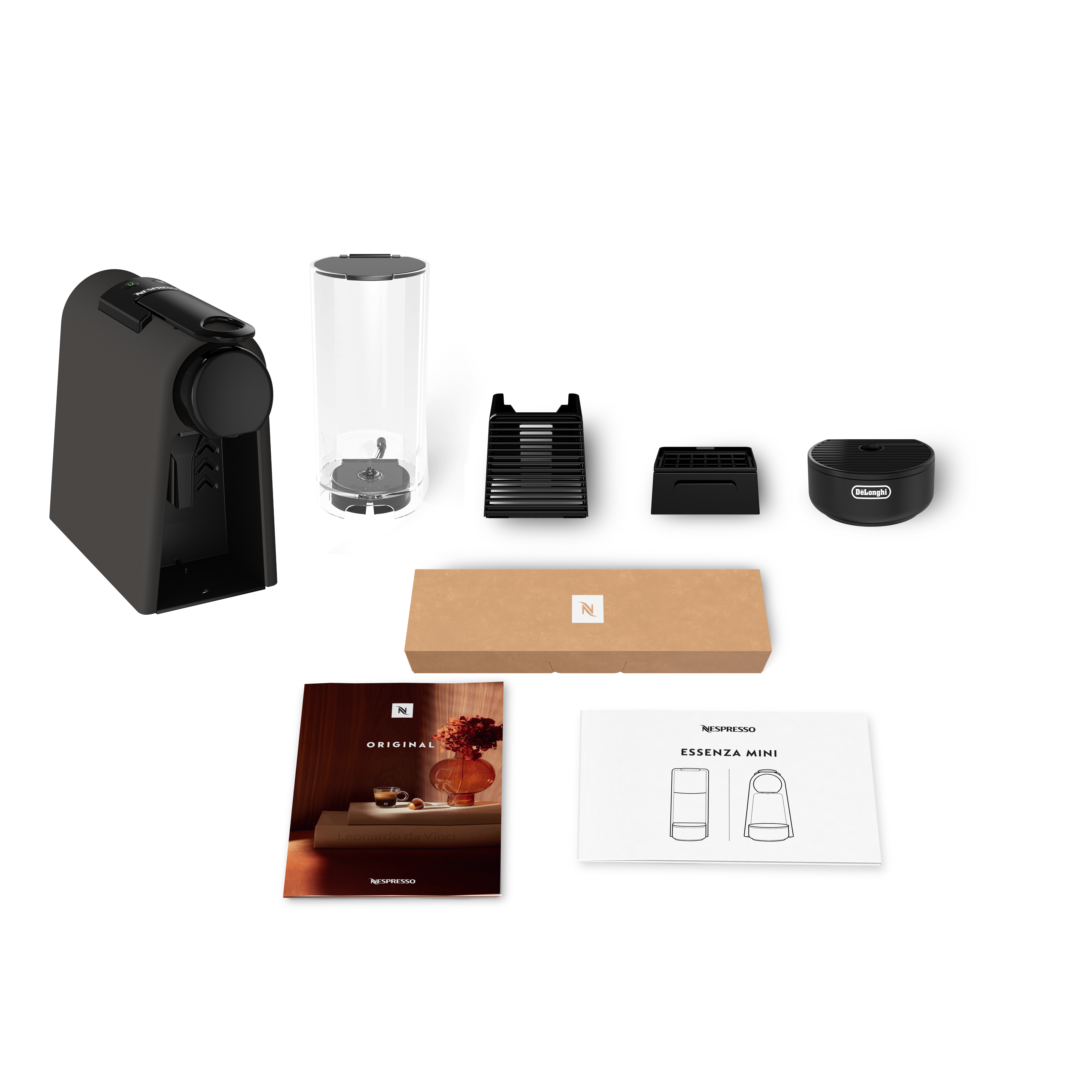 Eine Nespresso Essenza Mini Kaffeemaschine mit Zubehör, einschließlich Wassertank, Tropfschale und Handbüchern, vor weißem Hintergrund.