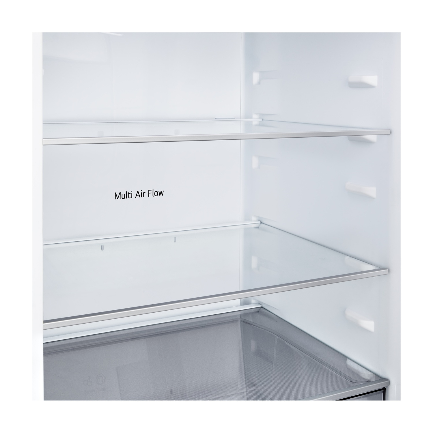 Interno di un frigorifero. Ripiani in vetro, interno bianco. Testo 'Multi Air Flow'. Un cassetto è visibile in basso.
