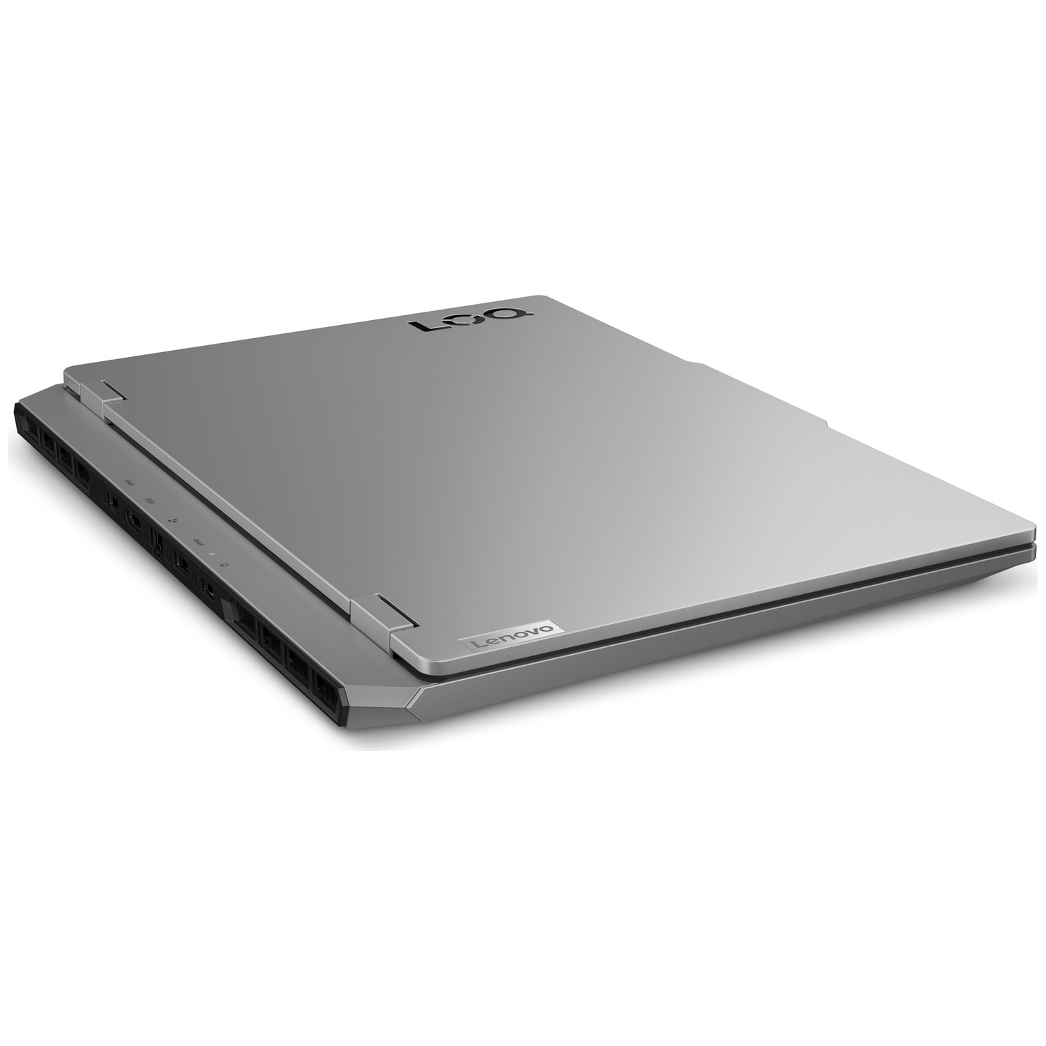 Silver Lenovo laptop. The lid is closed. The word 'Lenovo' is visible. The 'LOQ' logo is on the lid. The laptop is on a white surface.