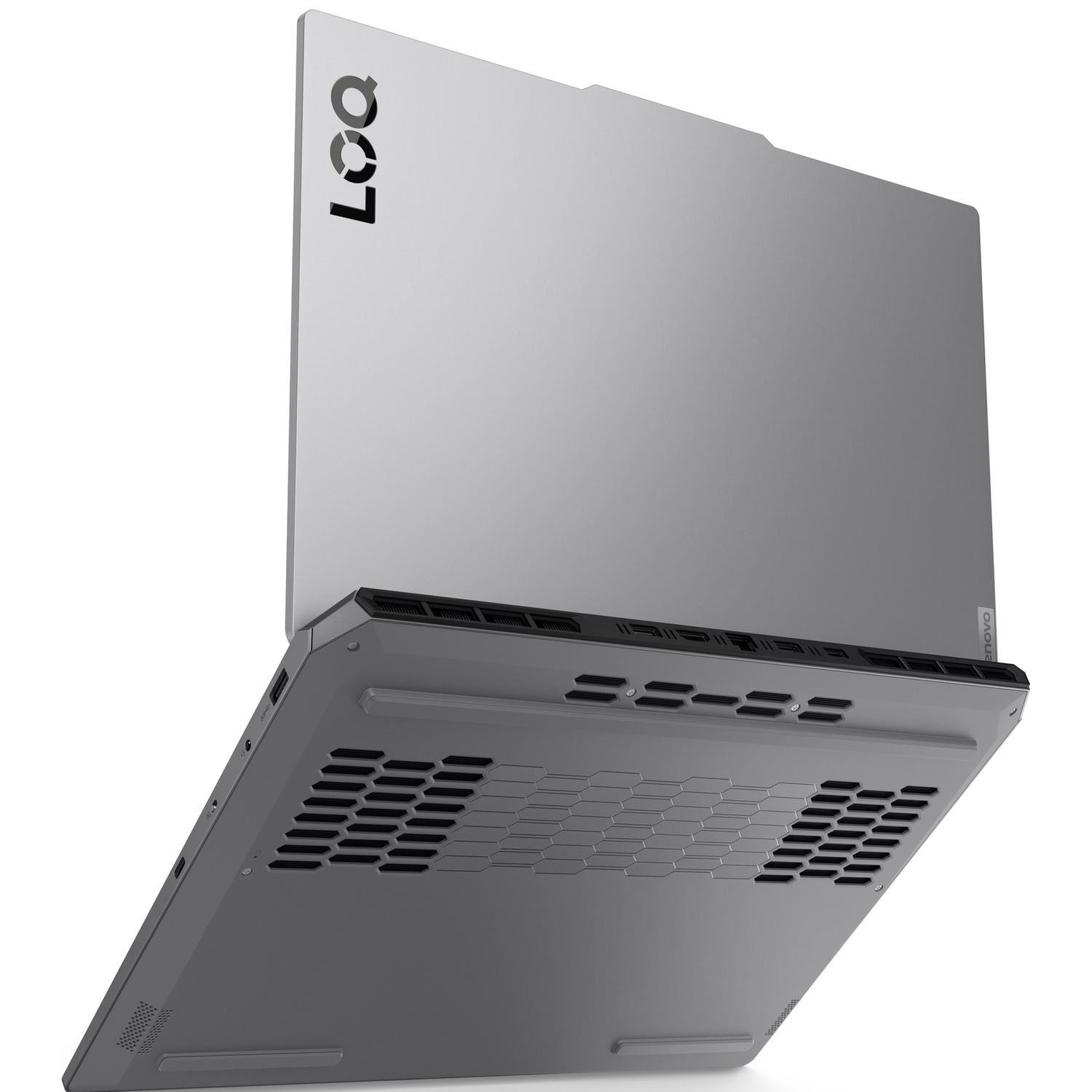 A silver Lenovo Legion laptop is shown from a low angle. The laptop is open, revealing a gray underside with vents and ports.