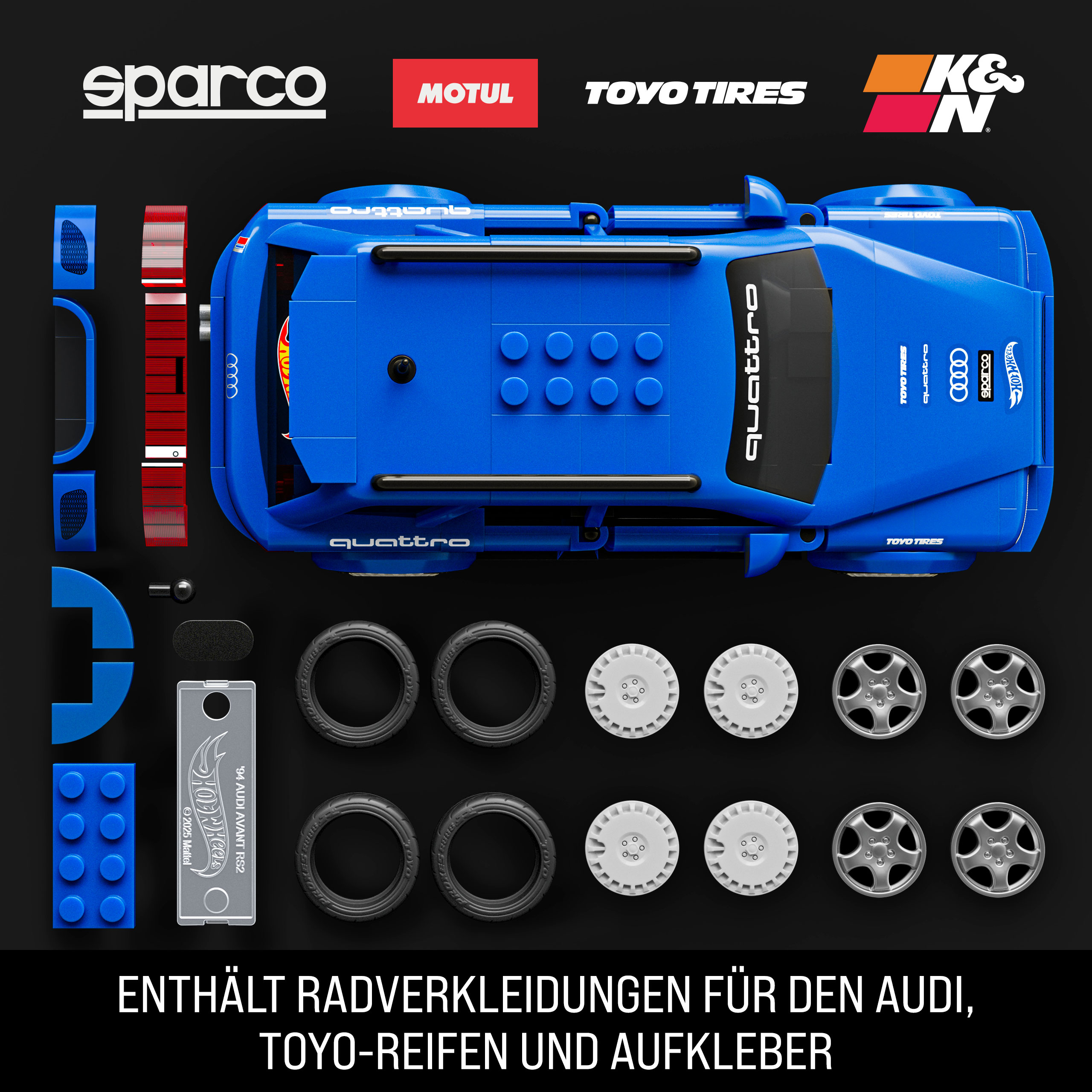 Blaues Spielzeugauto mit Teilen und Logos wie Sparco, Motul und Toyo Tires auf schwarzem Hintergrund.