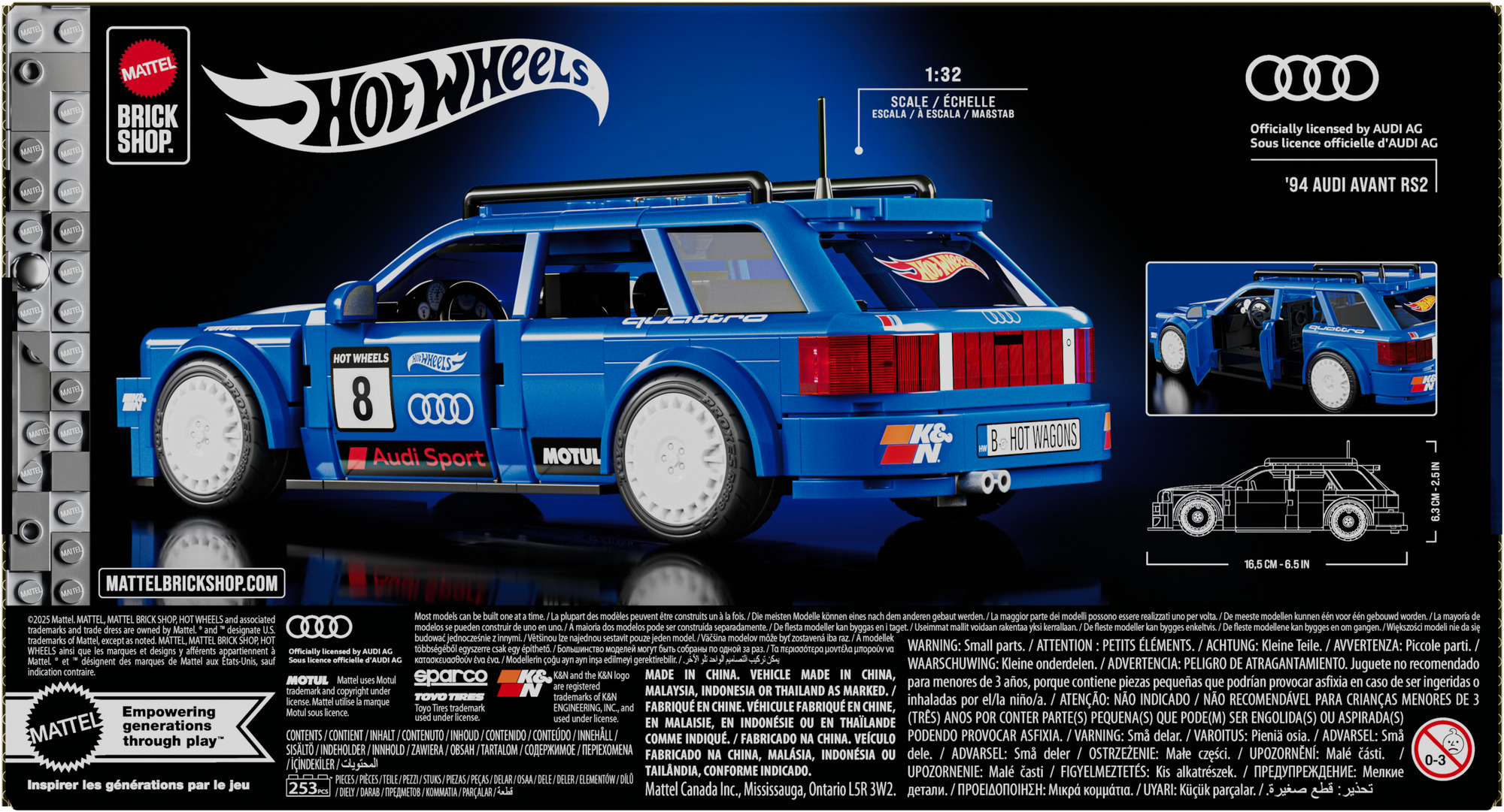 Blaues Hot Wheels Audi Automodell auf schwarzem Hintergrund. Das Auto hat weiße Räder und Logos.