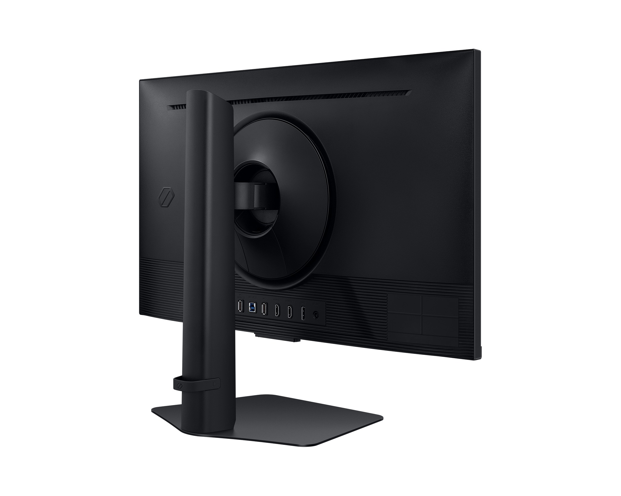 Die Rückseite eines schwarzen Computermonitors wird gezeigt. Es hat einen Ständer, Anschlüsse und ein kreisförmiges Designelement auf der Rückseite.