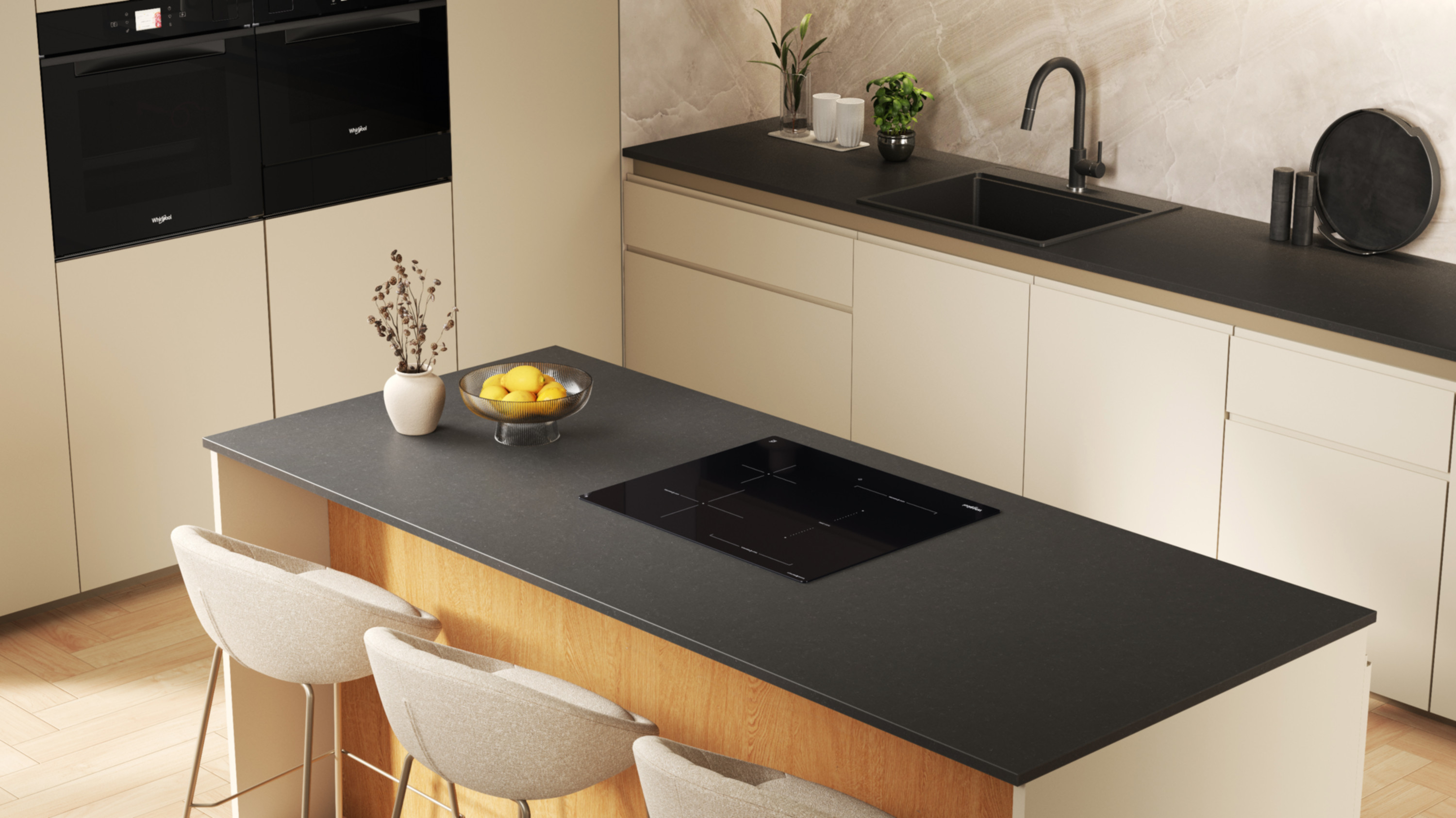 Nowoczesna kuchnia z wyspą. Zawiera płytę grzejną, zlew i blat. Są stołki, piekarniki i szafki.