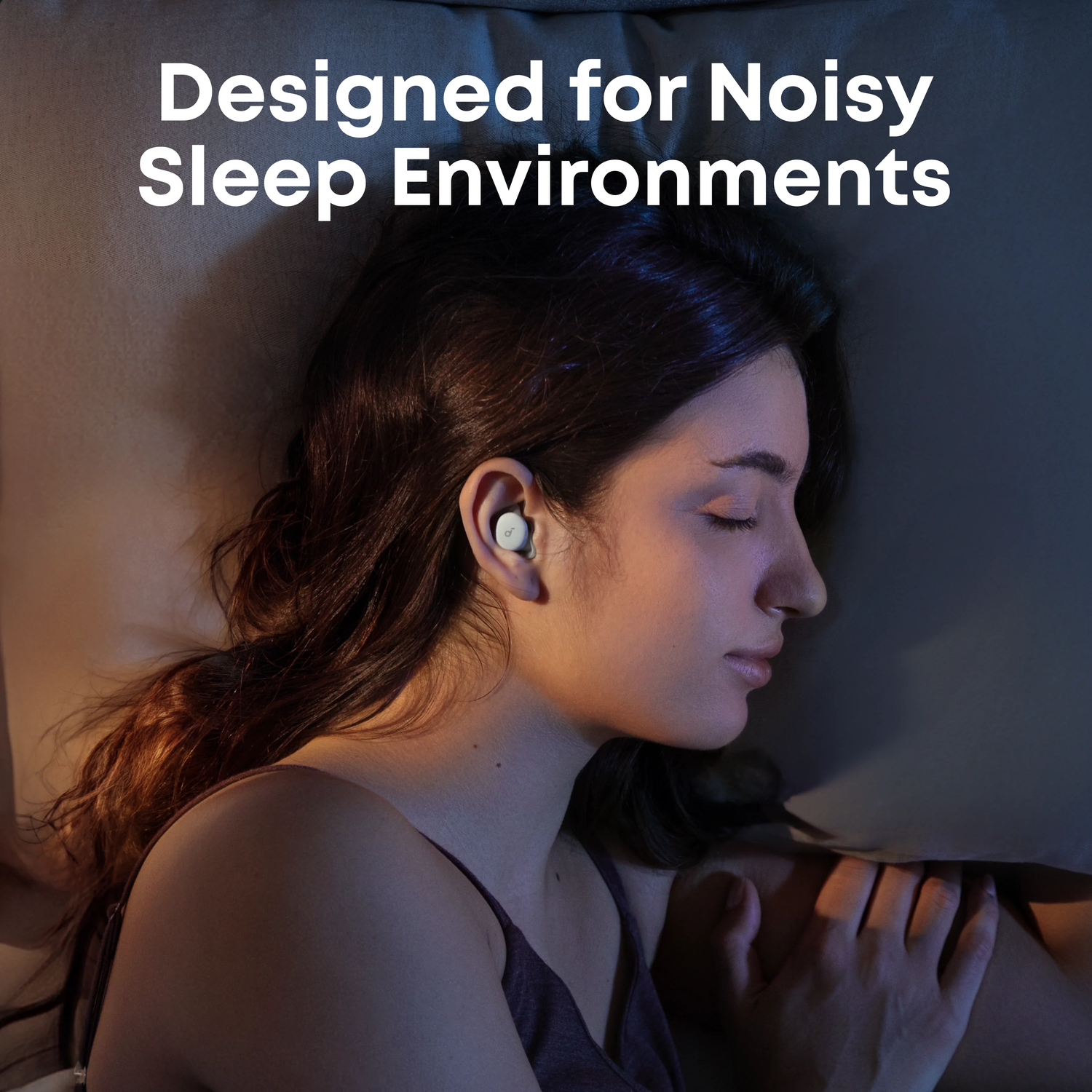 A woman with earbuds lies on a bed. The image promotes noise-canceling earbuds for sleep. Text reads: Designed for Noisy Sleep Environments.