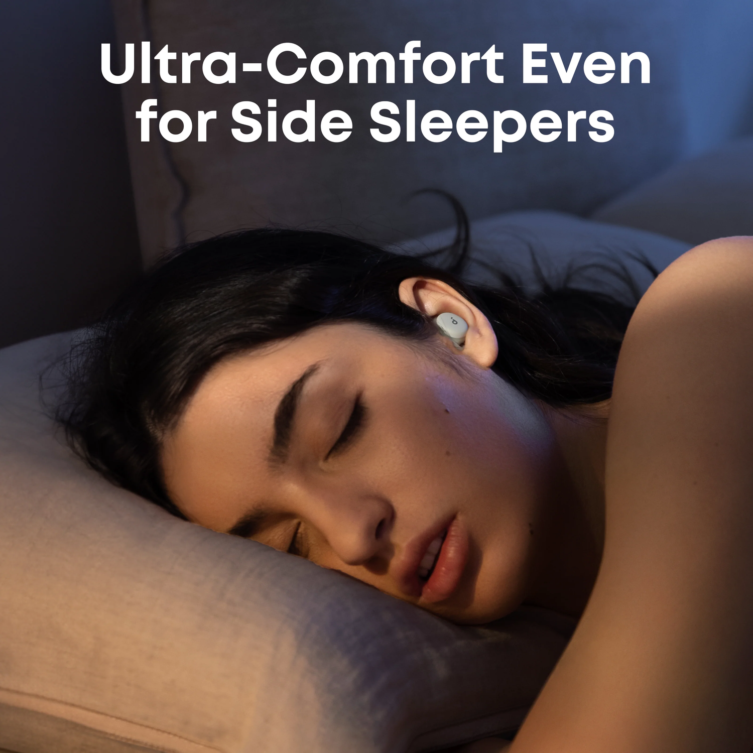 A woman sleeps on a pillow, wearing earbuds. Text reads 'Ultra-Comfort Even for Side Sleepers'.