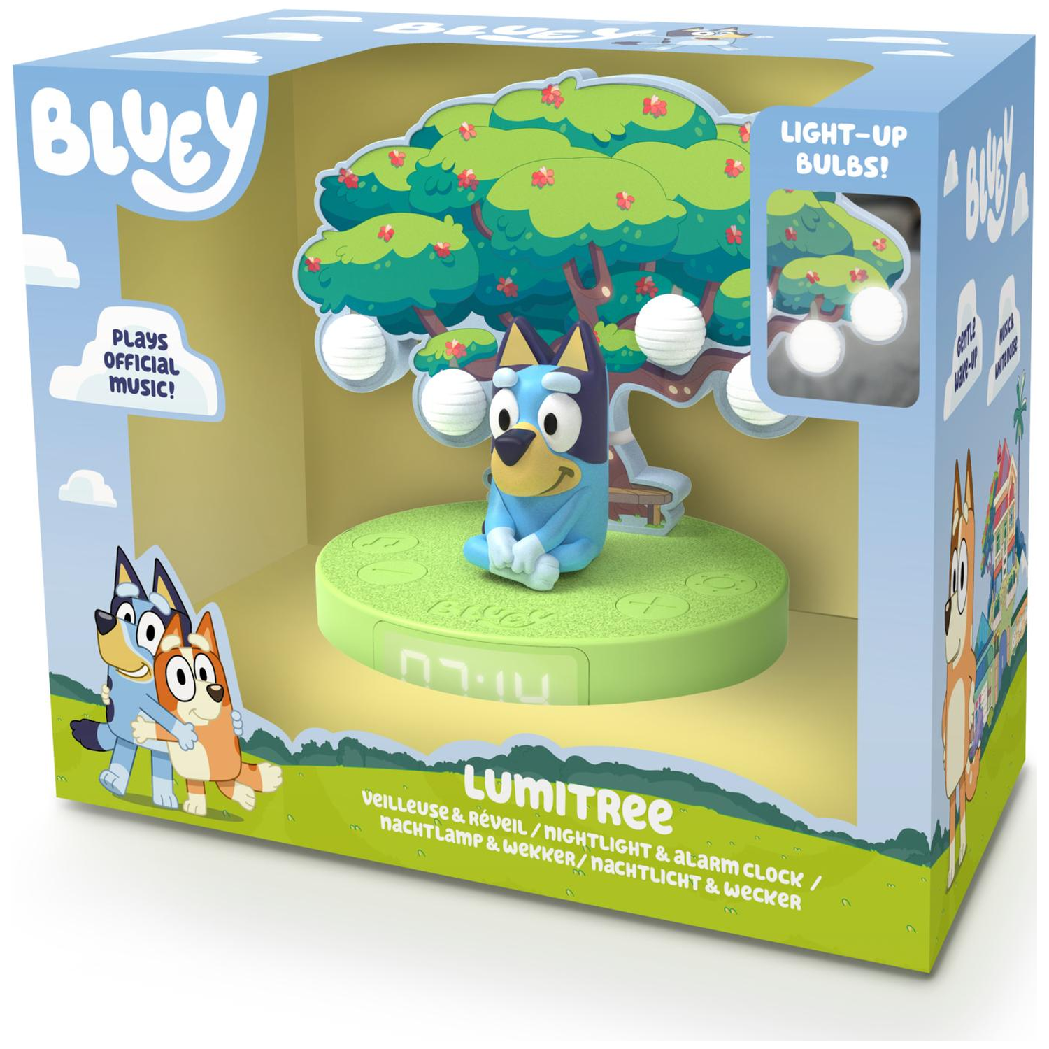 Bluey LumiTree nightlight and alarm clock. Bluey figure sits on a green base with a tree and light-up bulbs, packaged in a box.