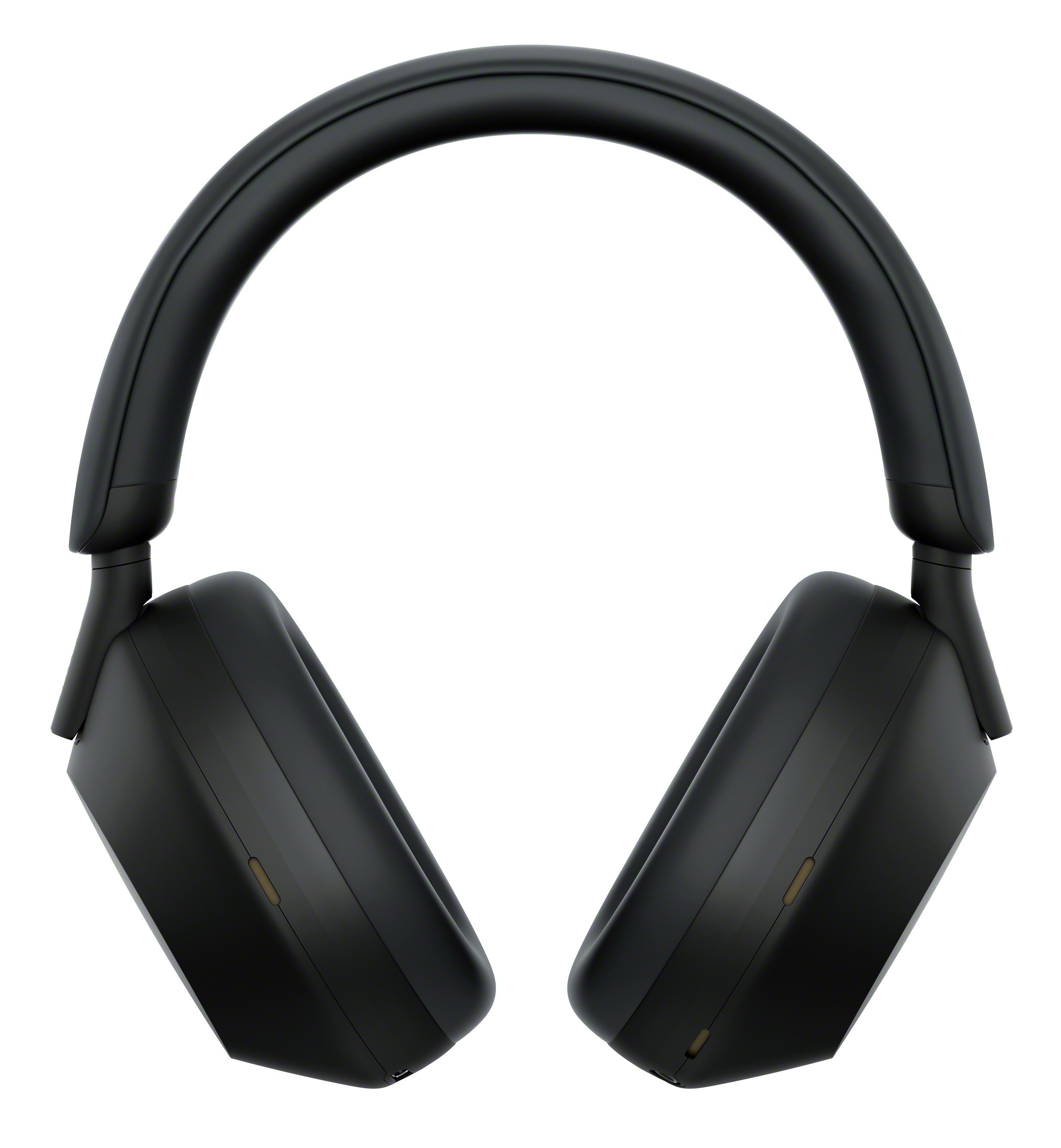 Czarne słuchawki na białym tle. Pałąk słuchawek łączy się z dwoma nausznicami o minimalistycznym designie.