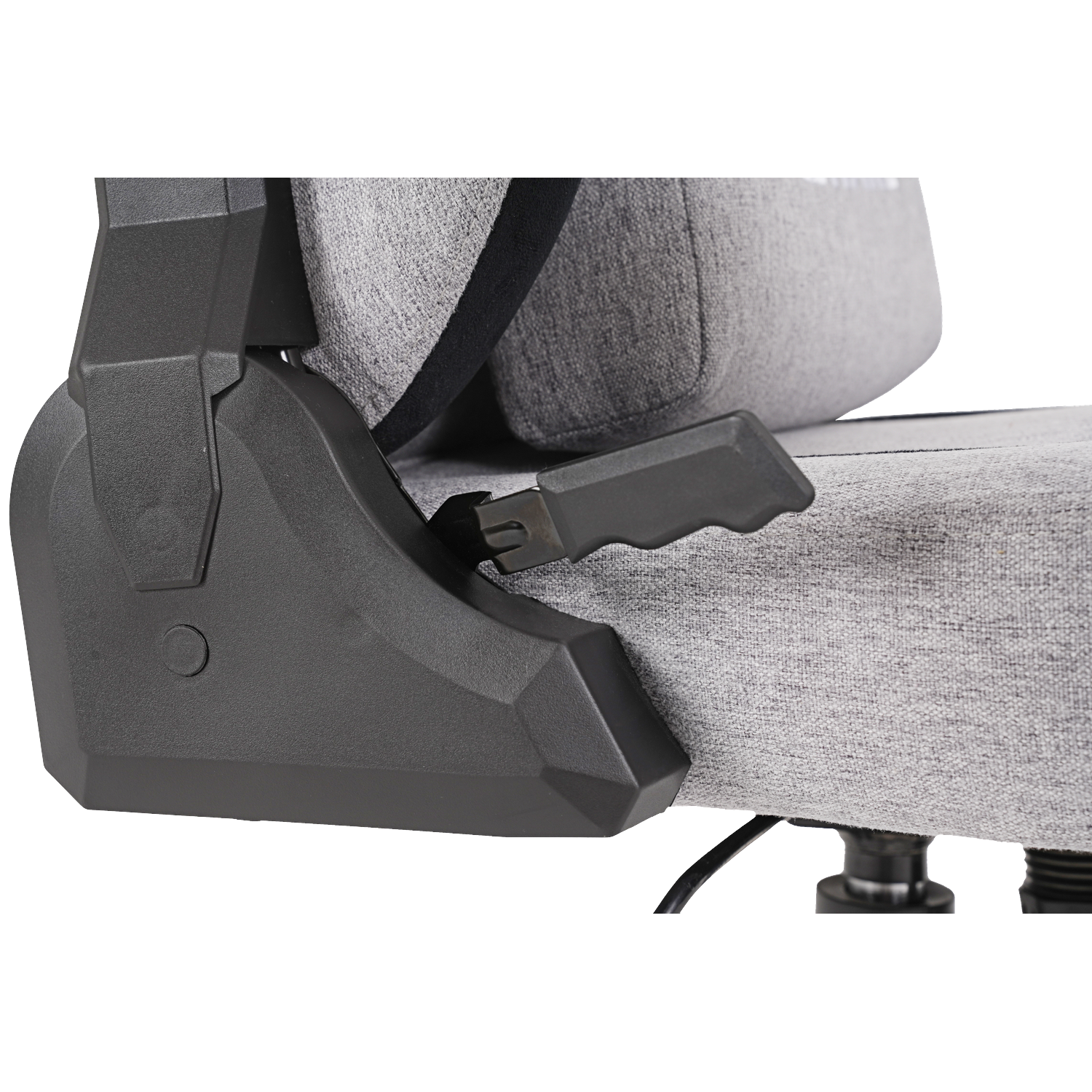 Close-up of a gray fabric chair. Black armrest lever and support are visible. The chair has a gray cushion and backrest.