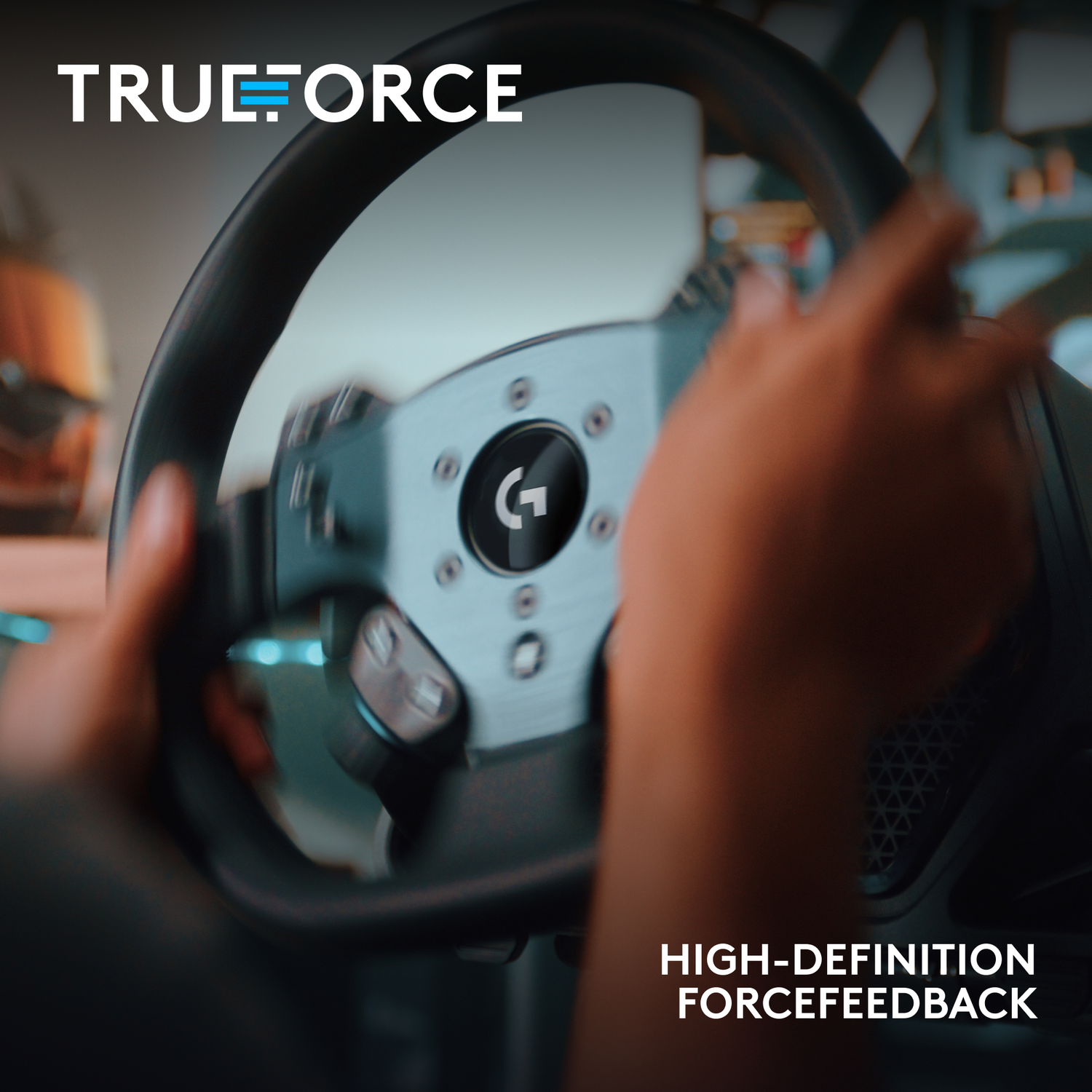 Hands holding a steering wheel. The logo 'TRUEFORCE' is visible, and the text 'HIGH-DEFINITION FORCEFEEDBACK' is displayed.