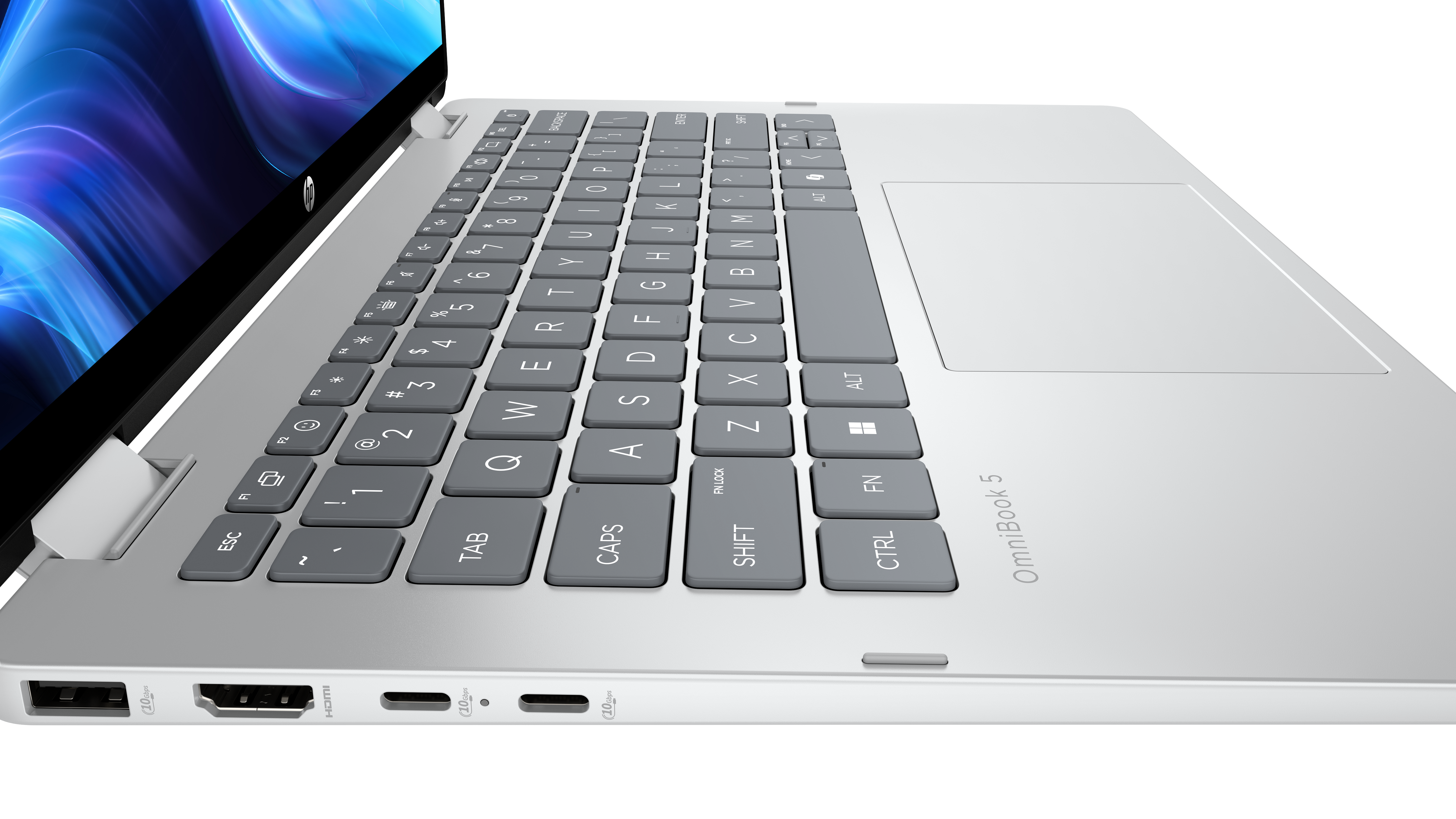 Srebrny laptop z szarą klawiaturą pokazany z perspektywy. Ekran jest otwarty, wyświetlając kolory niebieski i fioletowy.