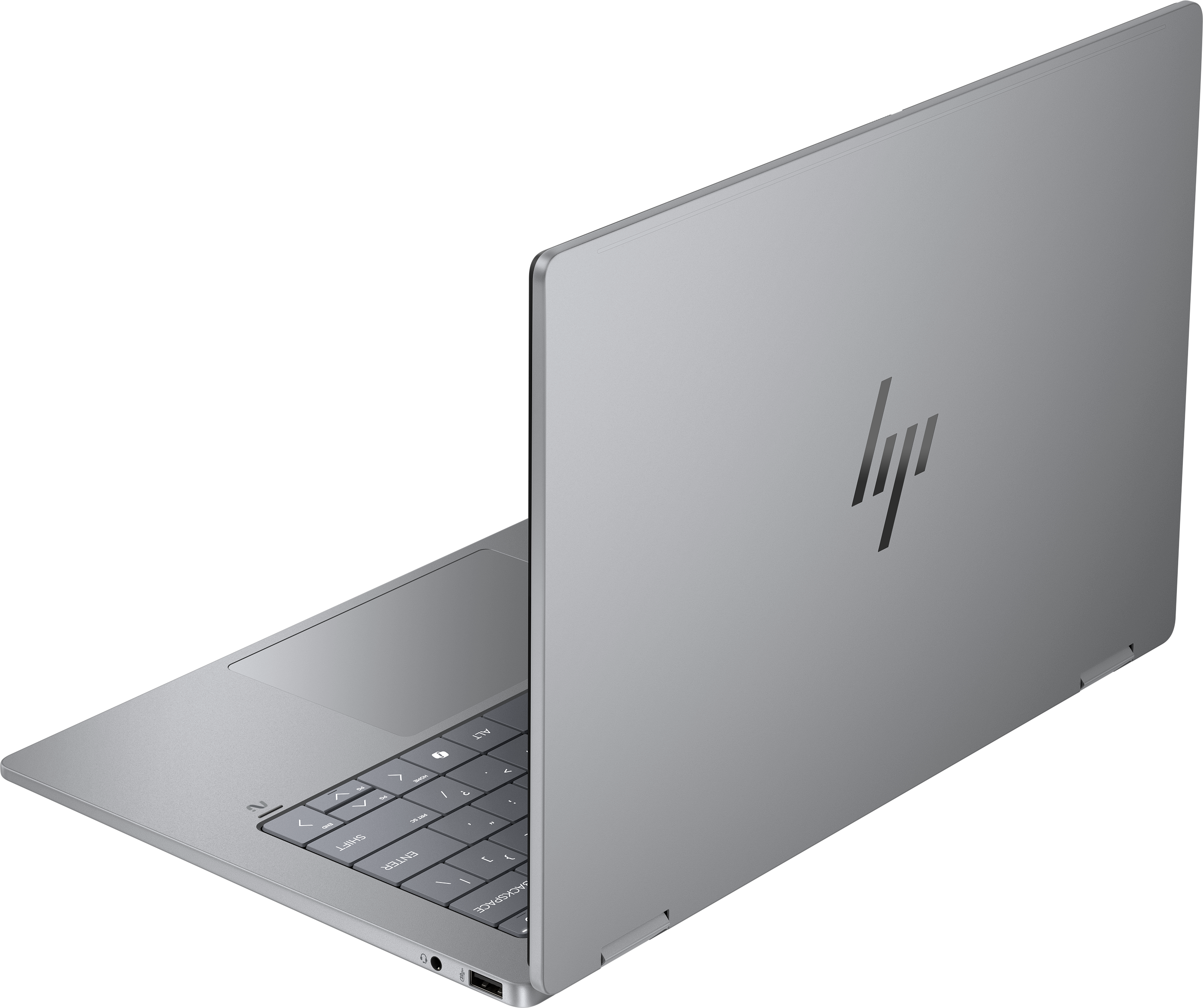 Un laptop HP argentato è leggermente aperto. La tastiera è visibile, con il logo HP sul coperchio.