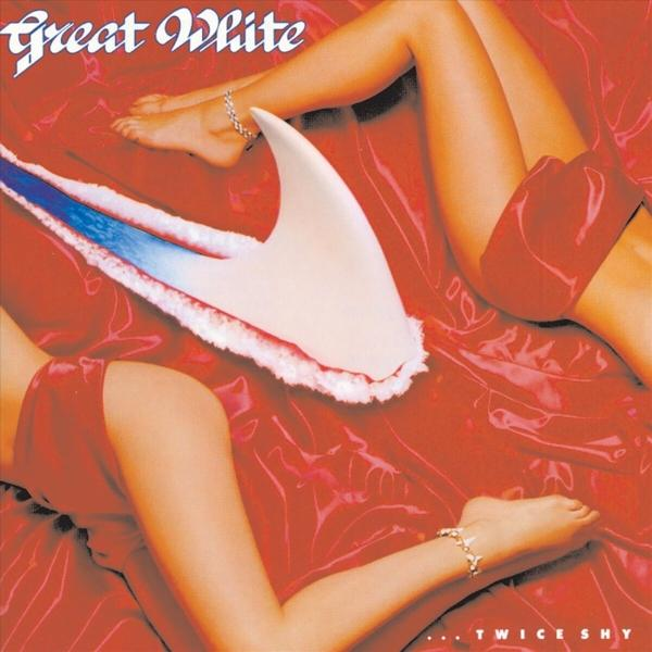 Albumcover. Roter Hintergrund, Haifischzahn und Beine von zwei Frauen. Ein Bein hat ein Armband. Text 'Great White' und 'Twice Shy'.