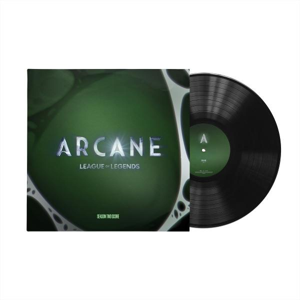 Eine 'Arcane: League of Legends'-Vinylplatte. Das Cover ist grün mit dem Titel und die Schallplatte ist schwarz mit einem grünen Zentrum.