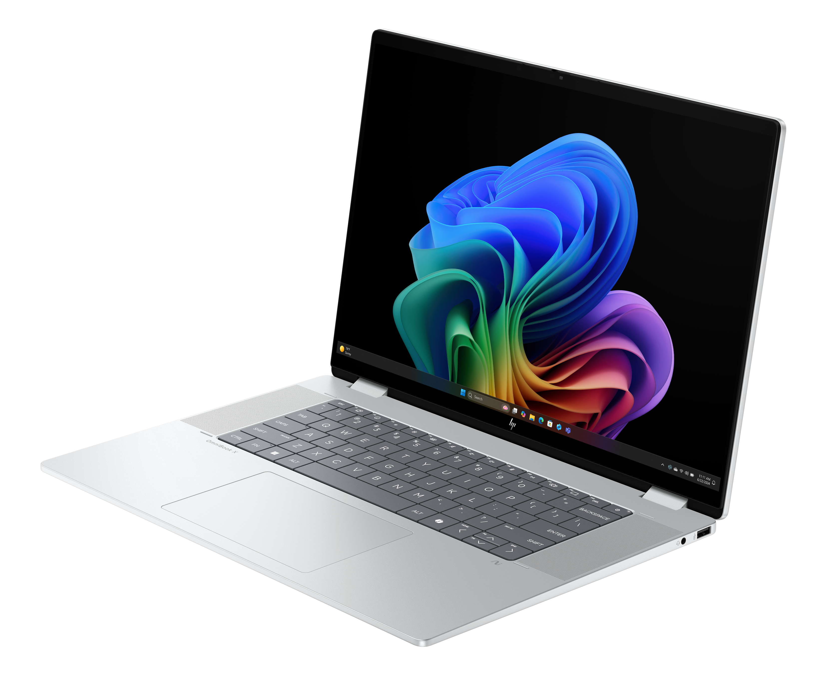 Srebrny laptop z kolorowym ekranem przedstawiającym wir. Klawiatura jest widoczna, a laptop jest pod kątem.