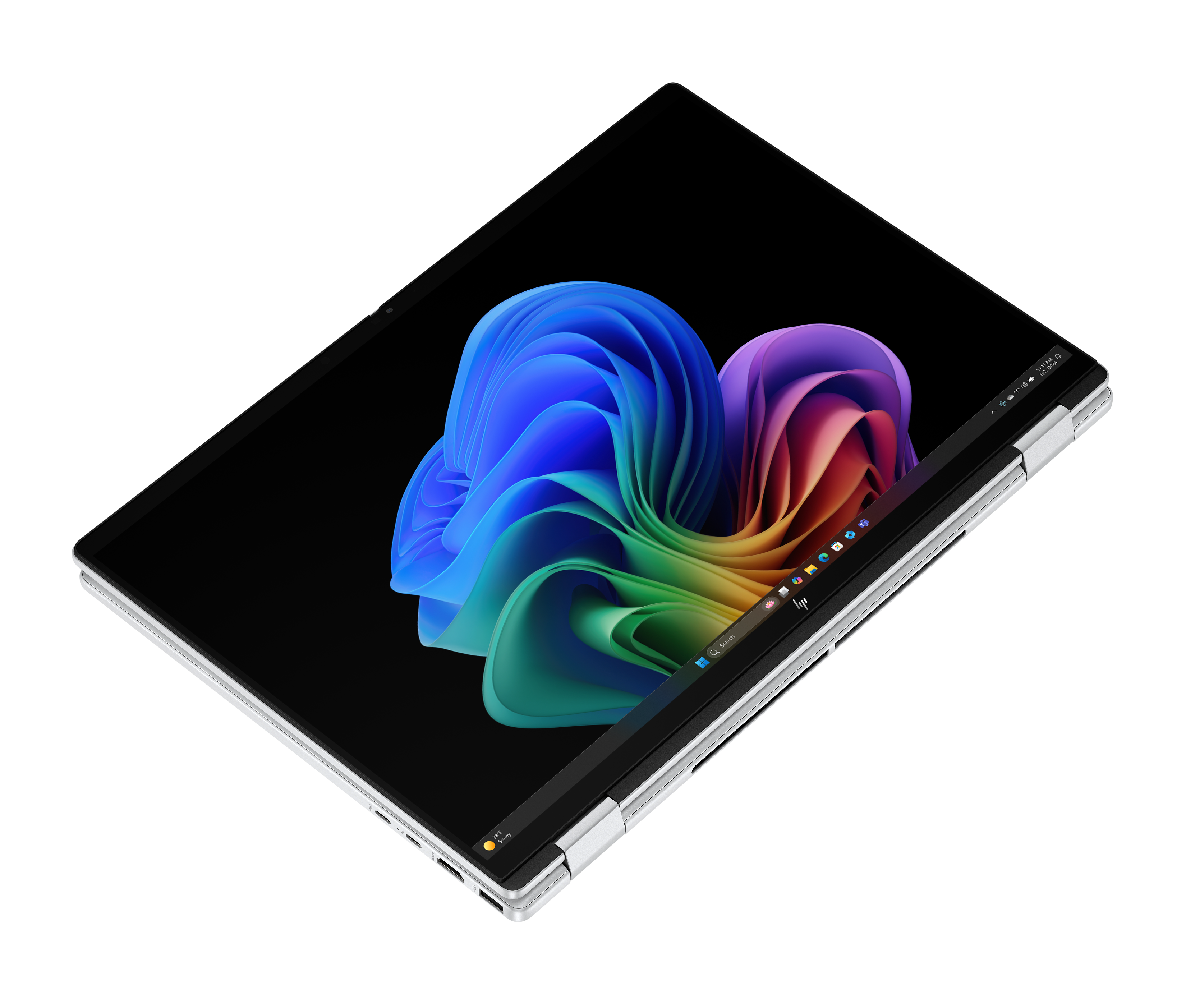 Laptop z kolorową, abstrakcyjną tapetą jest lekko otwarty. Ekran wyświetla niebiesko-zielony wzór wirowania.