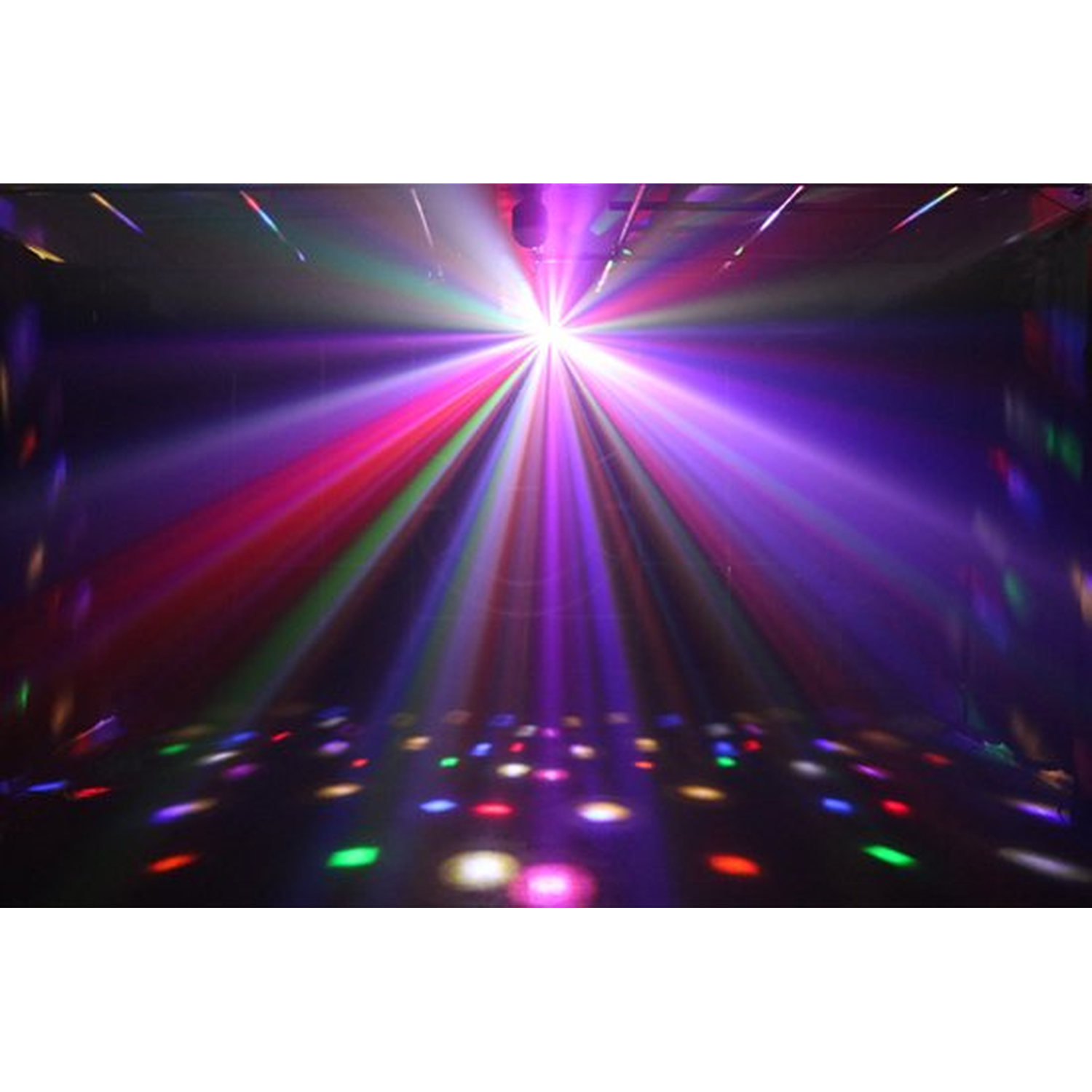 Een discoscène met een heldere centrale lichtbron die gekleurde stralen uitzendt. De vloer is donker met verspreide gekleurde lichten.