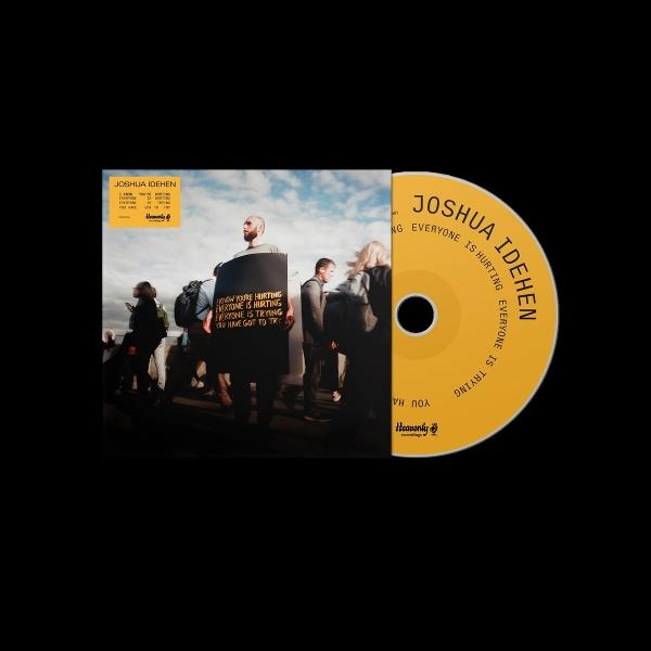 Albumcover mit einem Mann, der ein Schild mit der Aufschrift 'Now you're hurting...Everyone is trying' hält. Rechts ist eine CD.