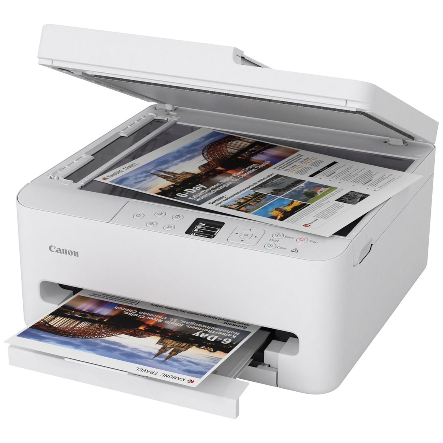 A white Canon printer with open lid. A brochure is being printed. The printer has a paper tray and several buttons.