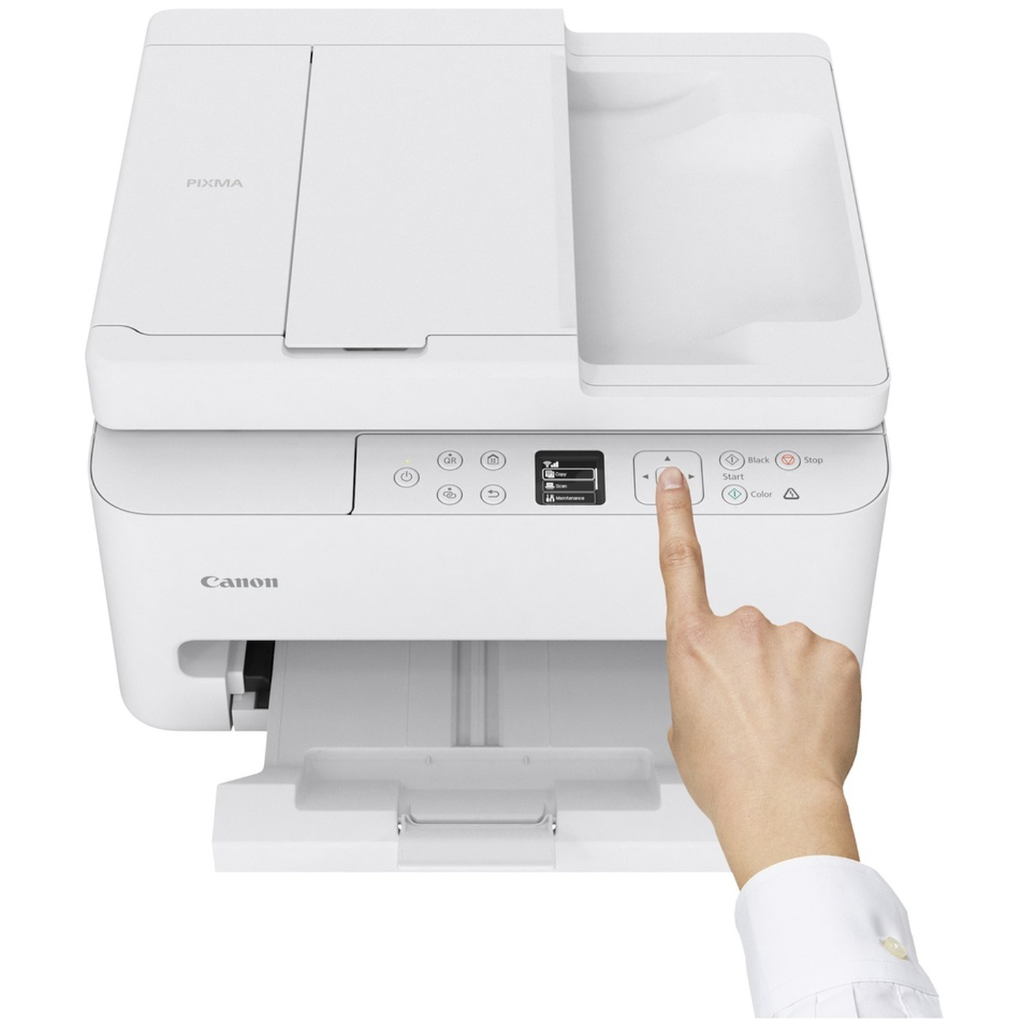 A hand presses a button on a white Canon printer. The printer is on a white background.