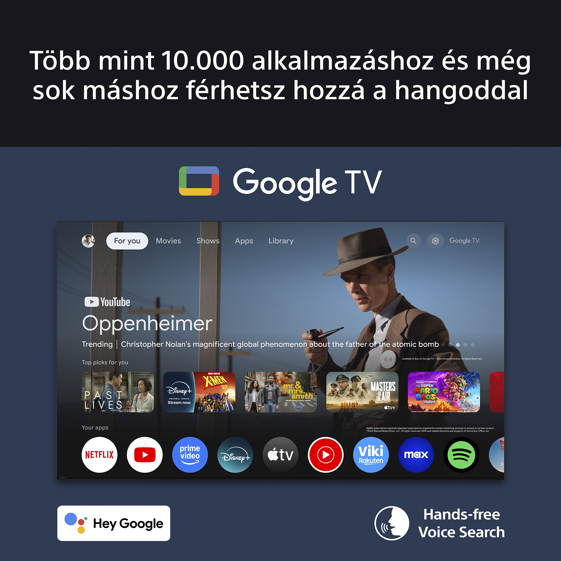 Google TV felület. Filmeket, alkalmazásokat és egy Oppenheimer-választékot mutat. Tartalmaz hangalapú keresést és Hey Google opciókat.