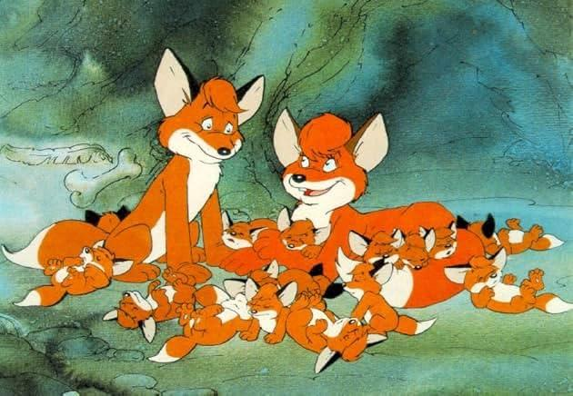 Der Cartoon zeigt zwei erwachsene Füchse mit zahlreichen Fuchswelpen. Die Füchse sind orange mit weißen Brüsten, vor einem grünen und blauen Hintergrund.