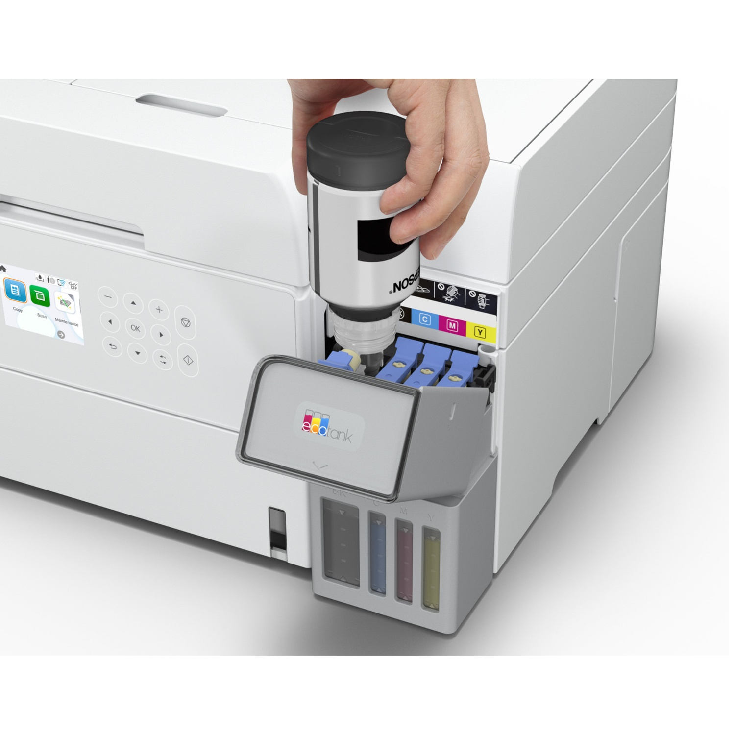 A hand pours ink from a black and white bottle into a white printer. The printer has colored ink tanks.
