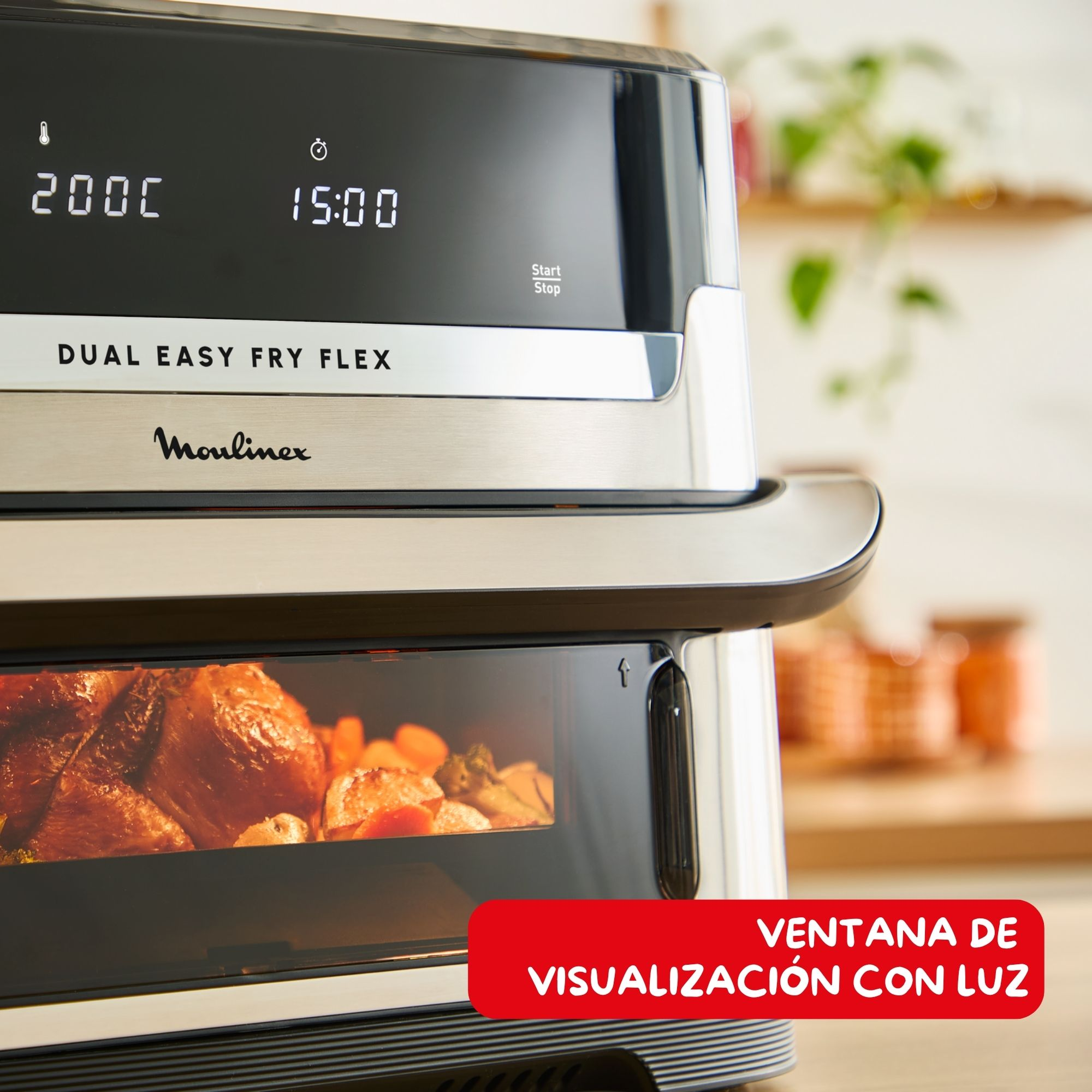 Una freidora de aire muestra 200C y 15:00. Tiene una ventana con comida dentro. La marca es Moulinex.