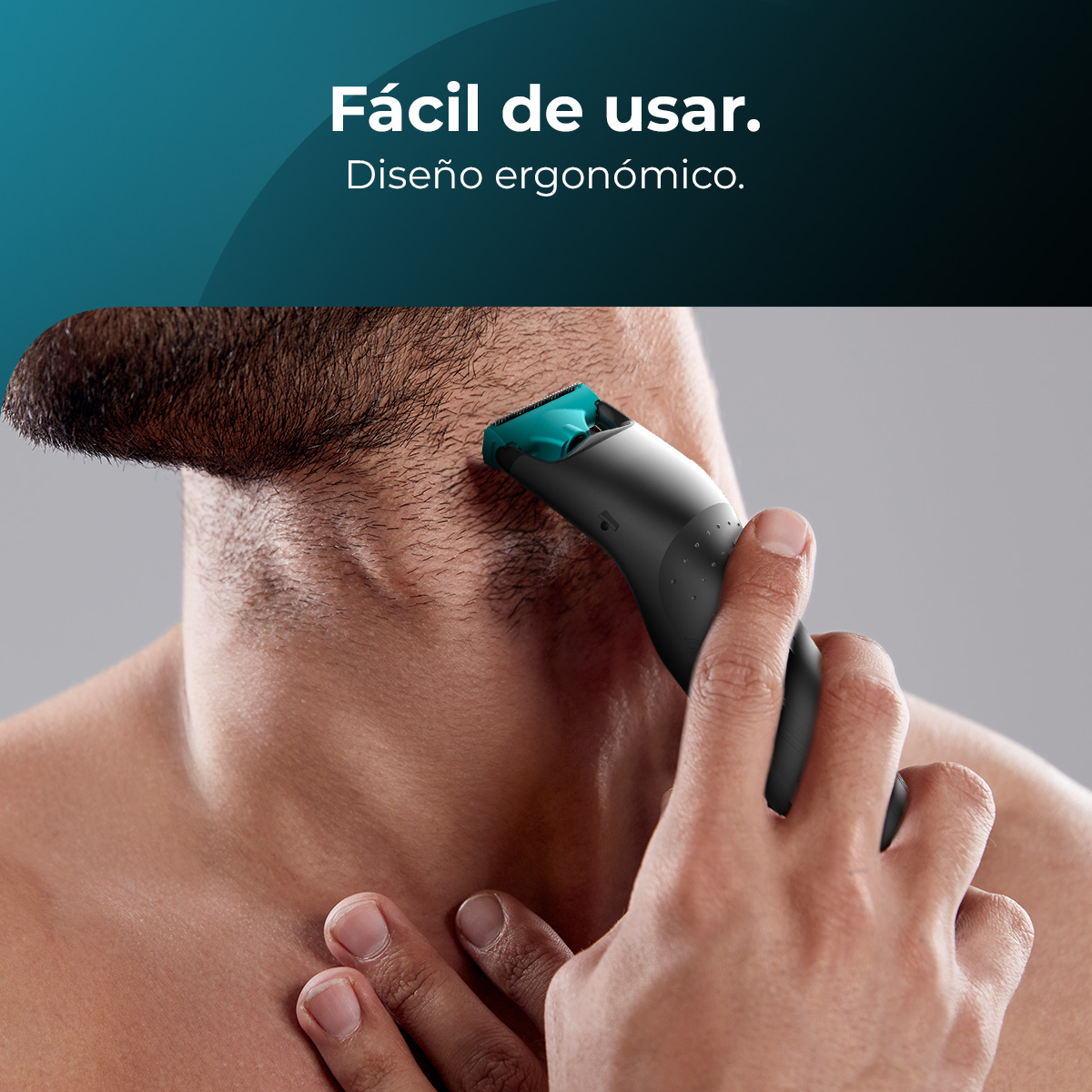 Un hombre se afeita el cuello con una afeitadora eléctrica. El dispositivo es negro y verde azulado. El texto dice 'Fácil de usar. Diseño ergonómico.'