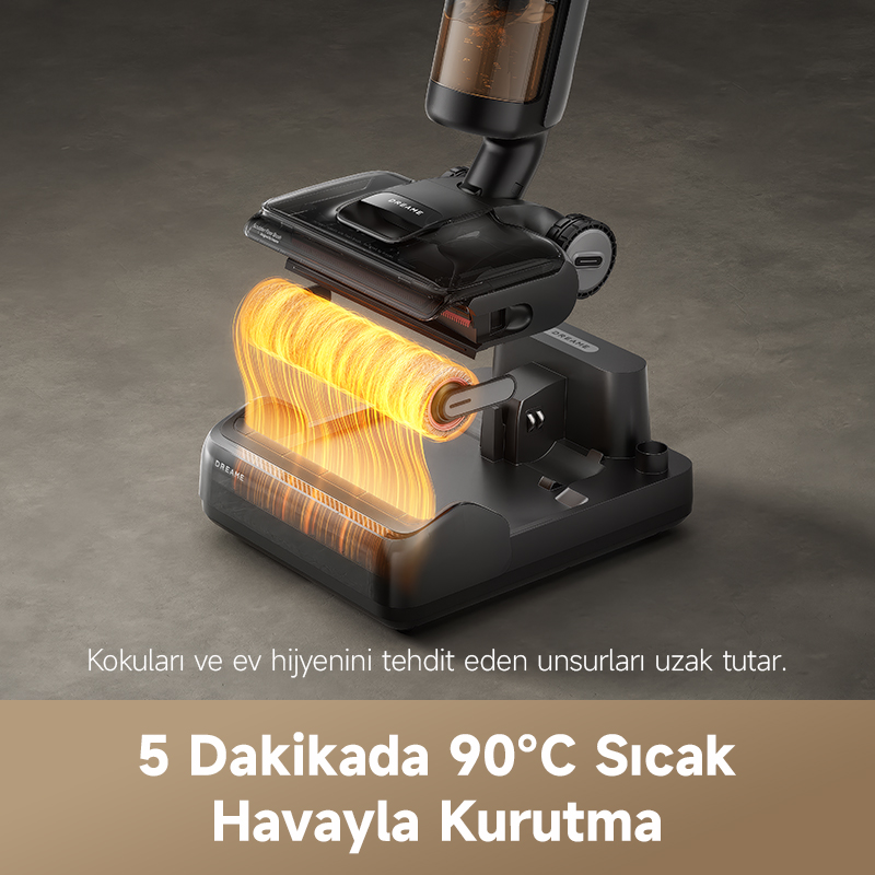 Siyah elektrikli süpürge, turuncu silindirle. Metin: '5 dakikada 90°C sıcak hava ile kurutma'. Arka plan gri.