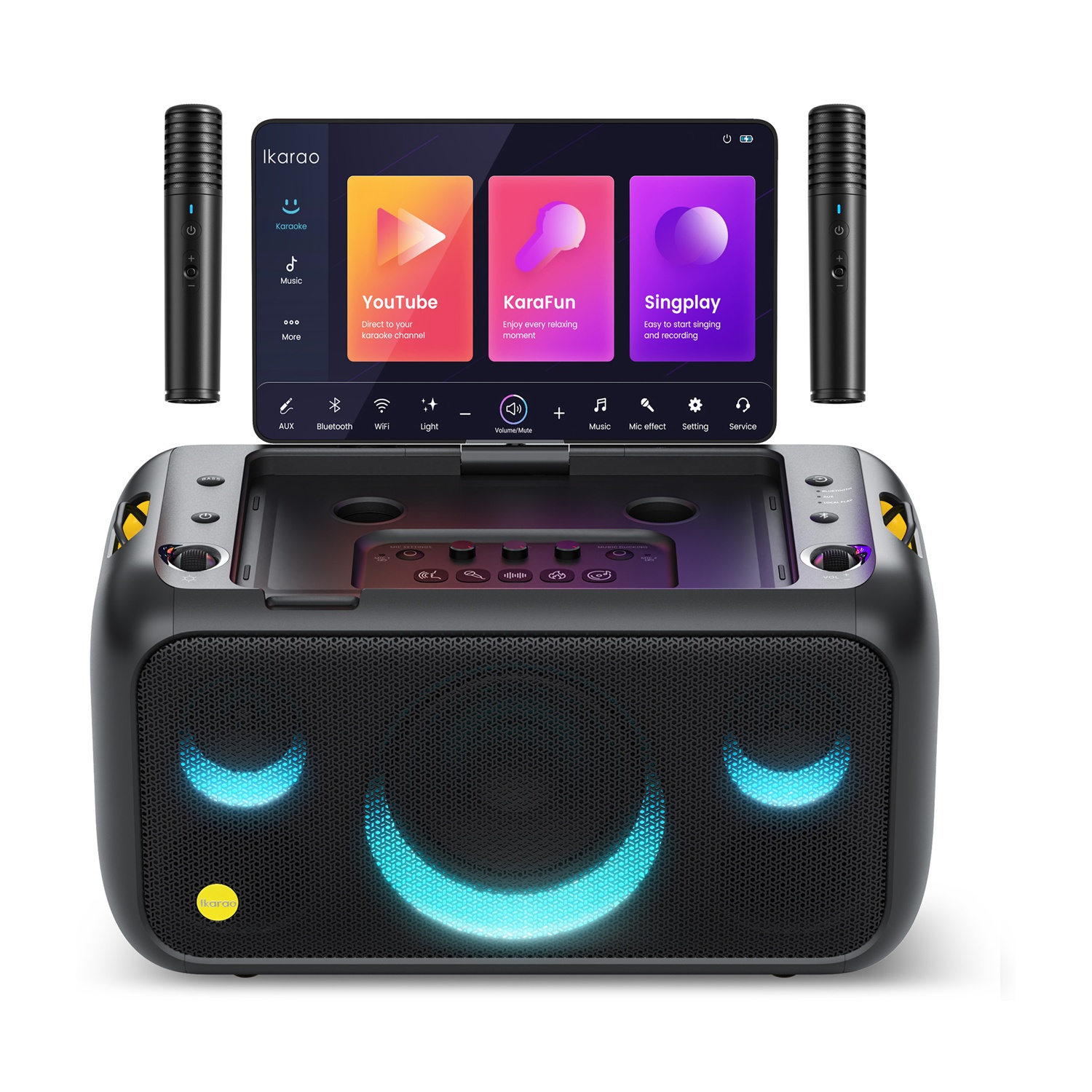 Una macchina per karaoke con schermo che mostra app, due microfoni e un altoparlante con un design a forma di faccia sorridente.