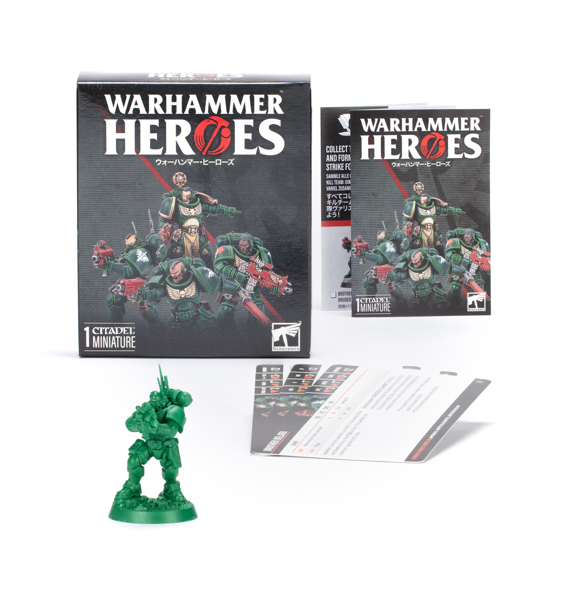 Warhammer Heroes Box-Set mit Miniaturen, Karten und einer grünen Plastikfigur. Schwarze Boxen mit Text und Bildern auf weißer Oberfläche.