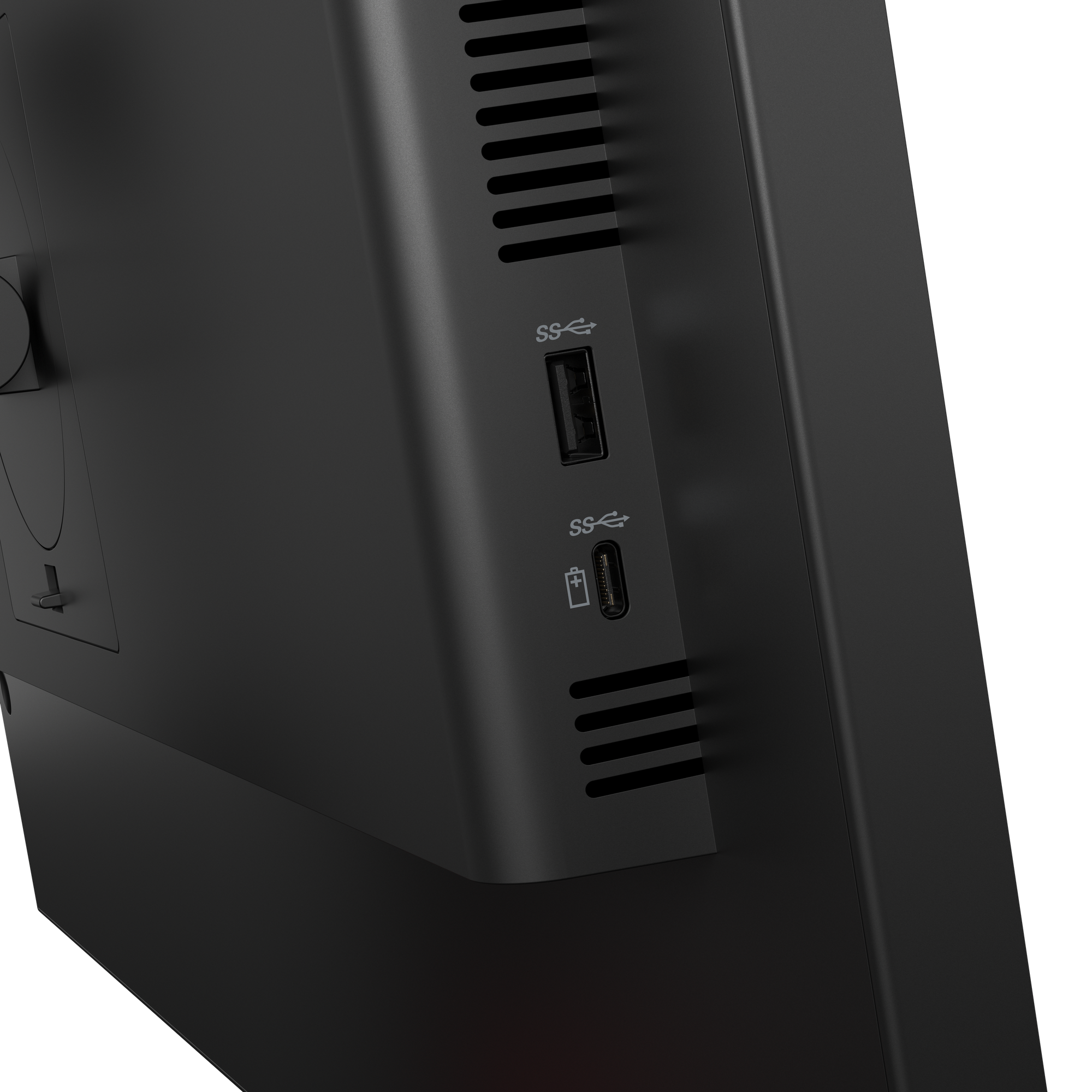 Nahaufnahme der Seite eines schwarzen Geräts. Es hat USB-Anschlüsse, Lüftungsschlitze und einen Stromanschluss.