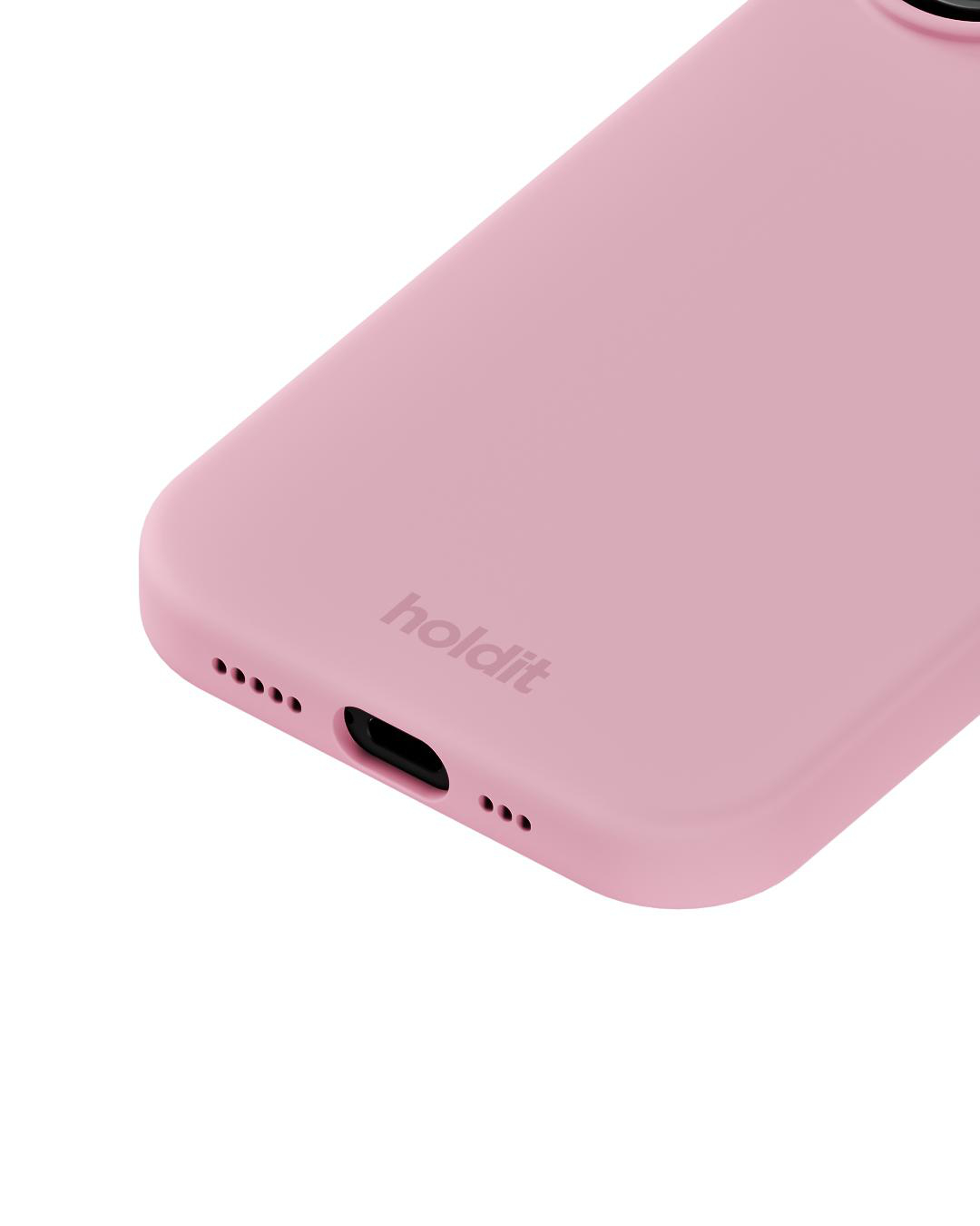 Eine rosa Handyhülle mit dem Markennamen 'holdit'. Sie ist angewinkelt und zeigt die Seite mit Löchern für Knöpfe und Kamera.