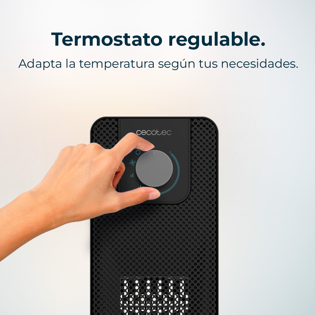 Una mano gira una perilla de termostato en un calentador negro. La perilla es gris. El texto dice 'Termostato ajustable'.