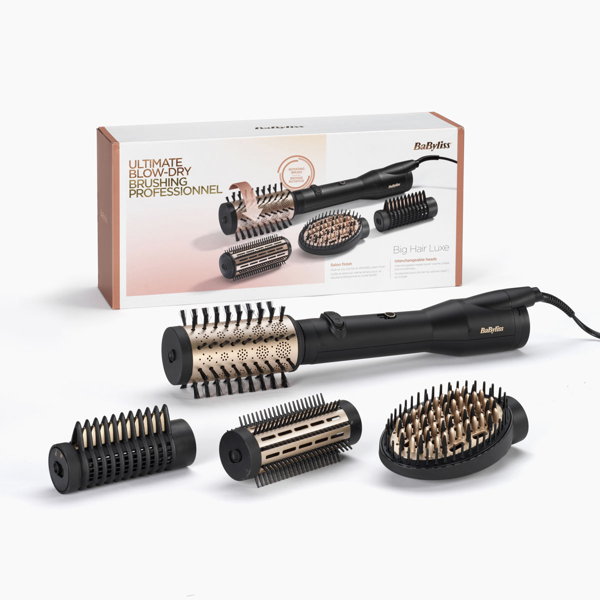 Ein Babyliss-Haarstyler-Set mit mehreren Bürstenköpfen, einer Box und einem Hauptgerät. Schwarze und goldene Farben dominieren das Produktdesign.