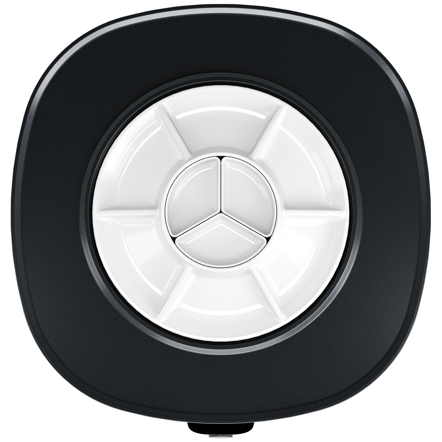 Close-up of a white and black object. The object has a circular design with a white center and a black outer ring.