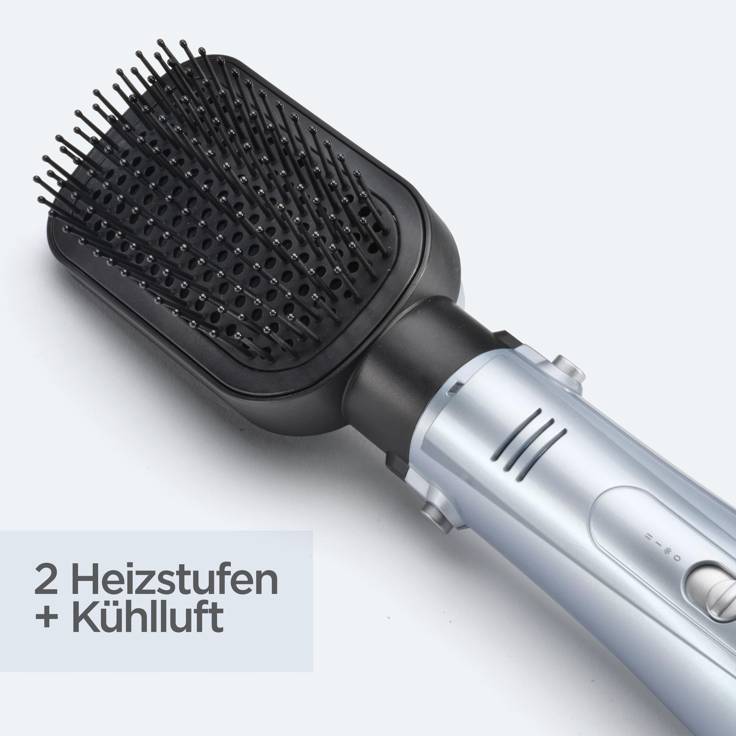 Eine Haarbürste, schwarze Borsten, silberner Griff. Text: 2 Heizstufen + Kühlluft.