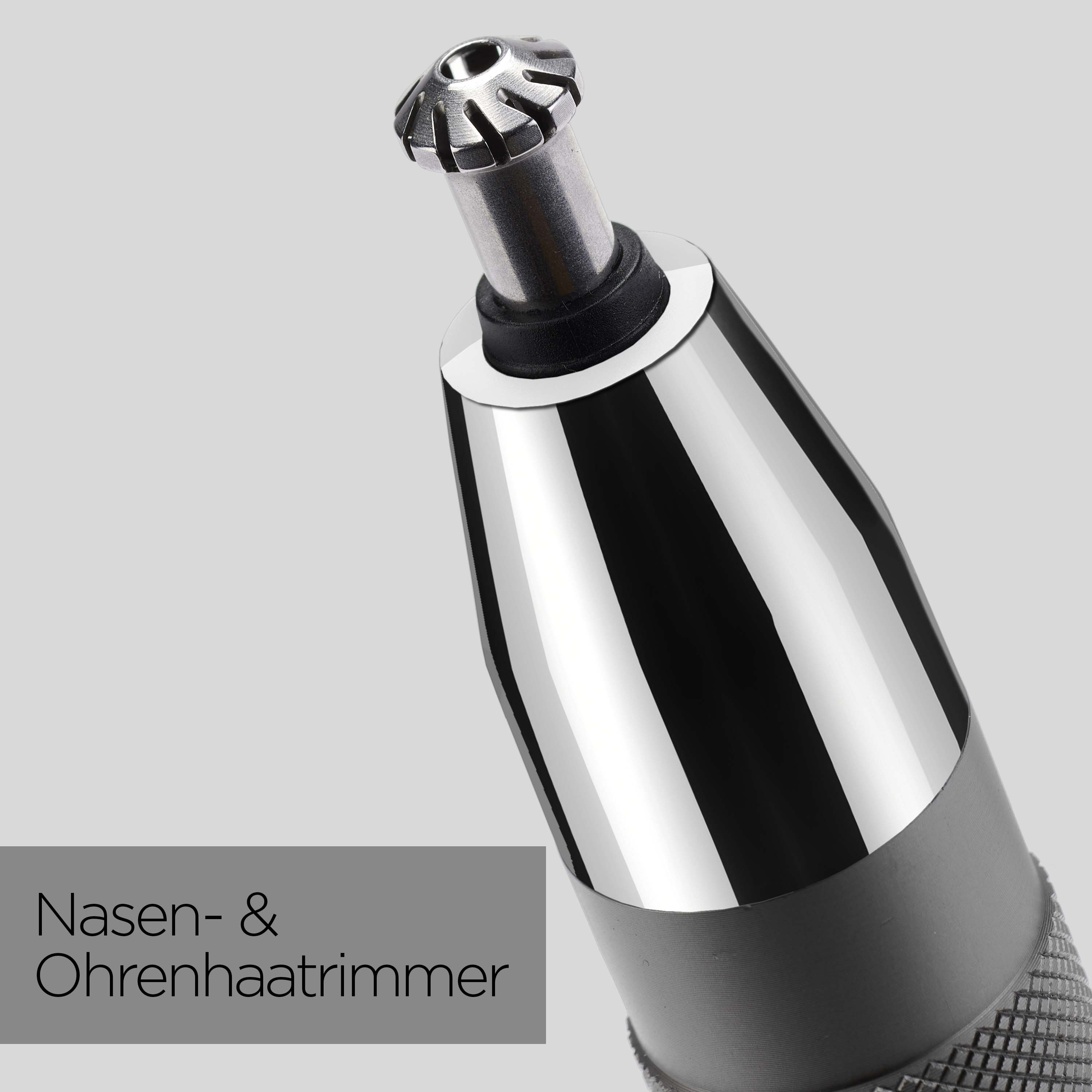 Nahaufnahme eines Nasen- und Ohrenhaartrimmers. Er hat einen silbernen Kopf und einen schwarz-silbernen Körper auf grauem Hintergrund.