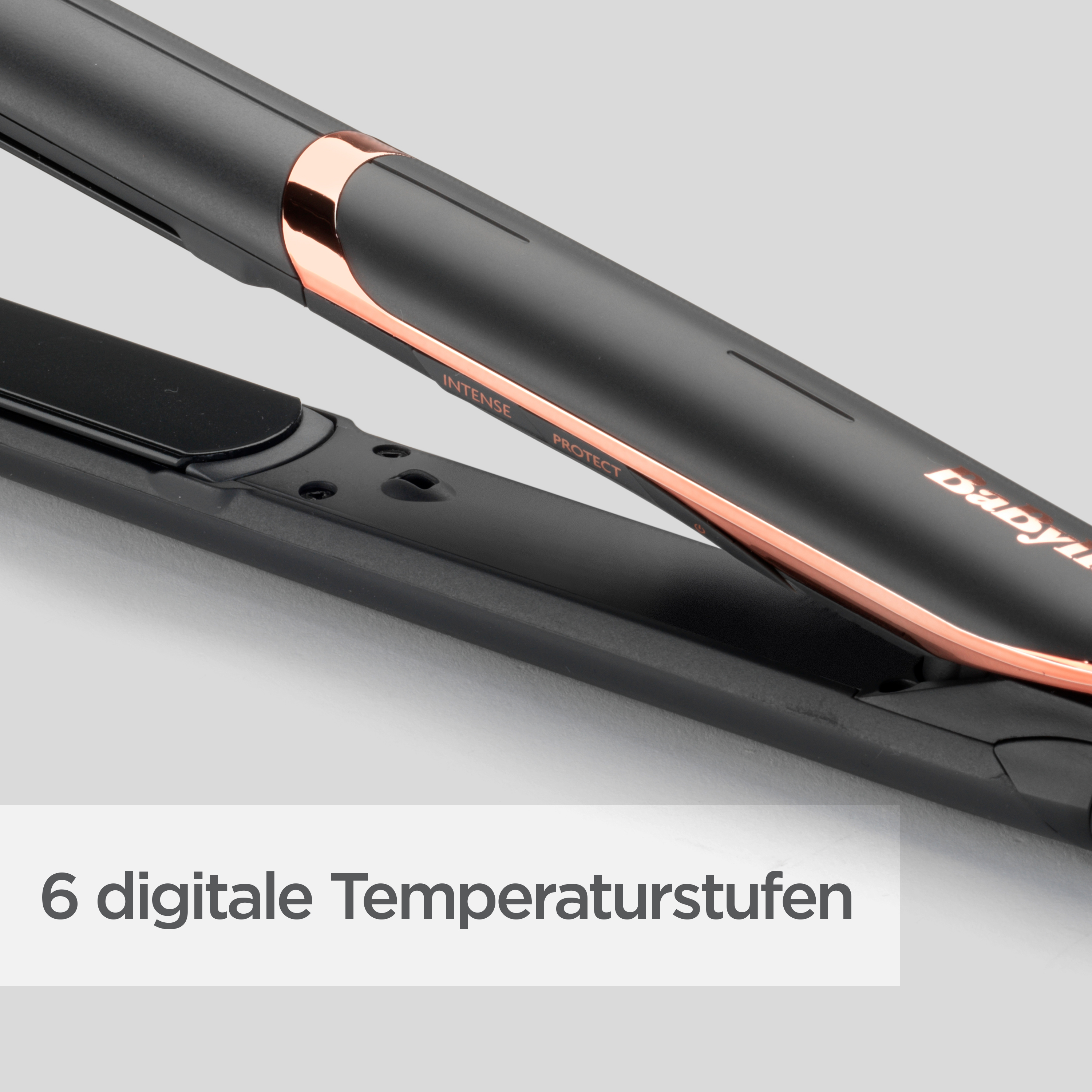 Nahaufnahme eines schwarzen und kupferfarbenen Haarglätters. Text unten: 6 digitale Temperaturstufen.