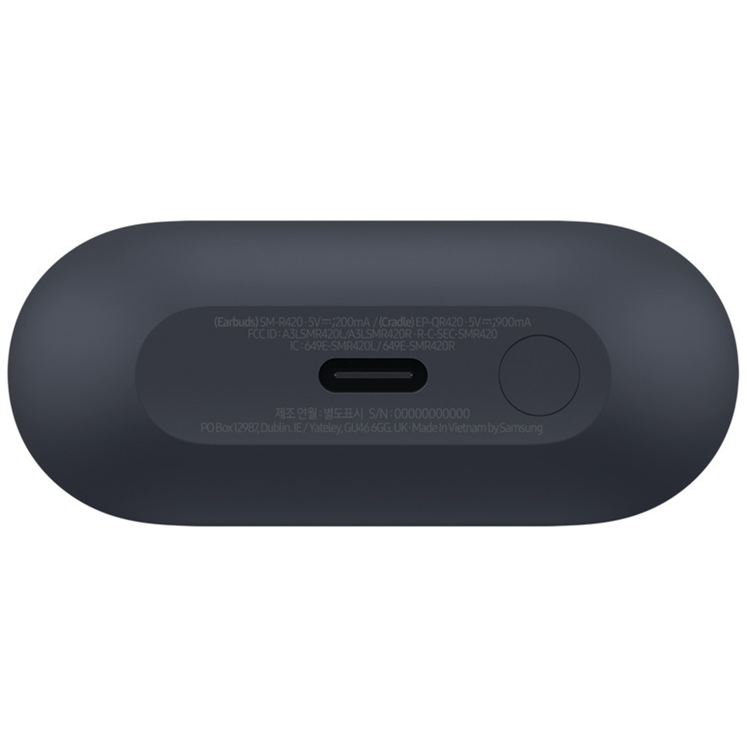 Dark gray, oval-shaped device, likely a charging case. Text details specs and manufacturing location. The device is made by Samsung.