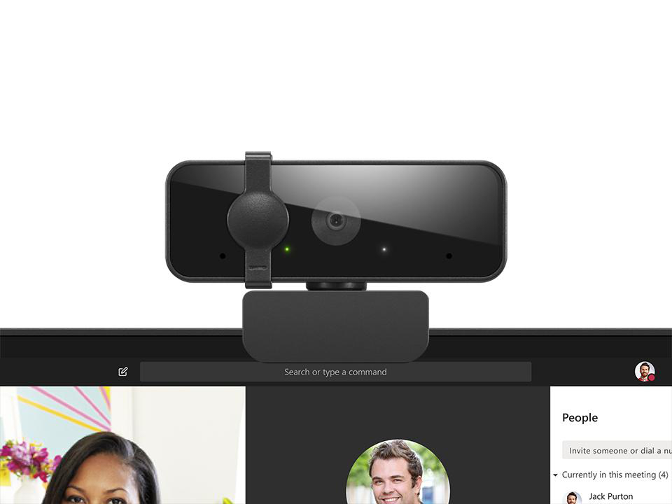 Oben befindet sich eine Webcam. Darunter ist eine Videoanrufoberfläche mit Teilnehmerprofilen und einer Suchleiste zu sehen.