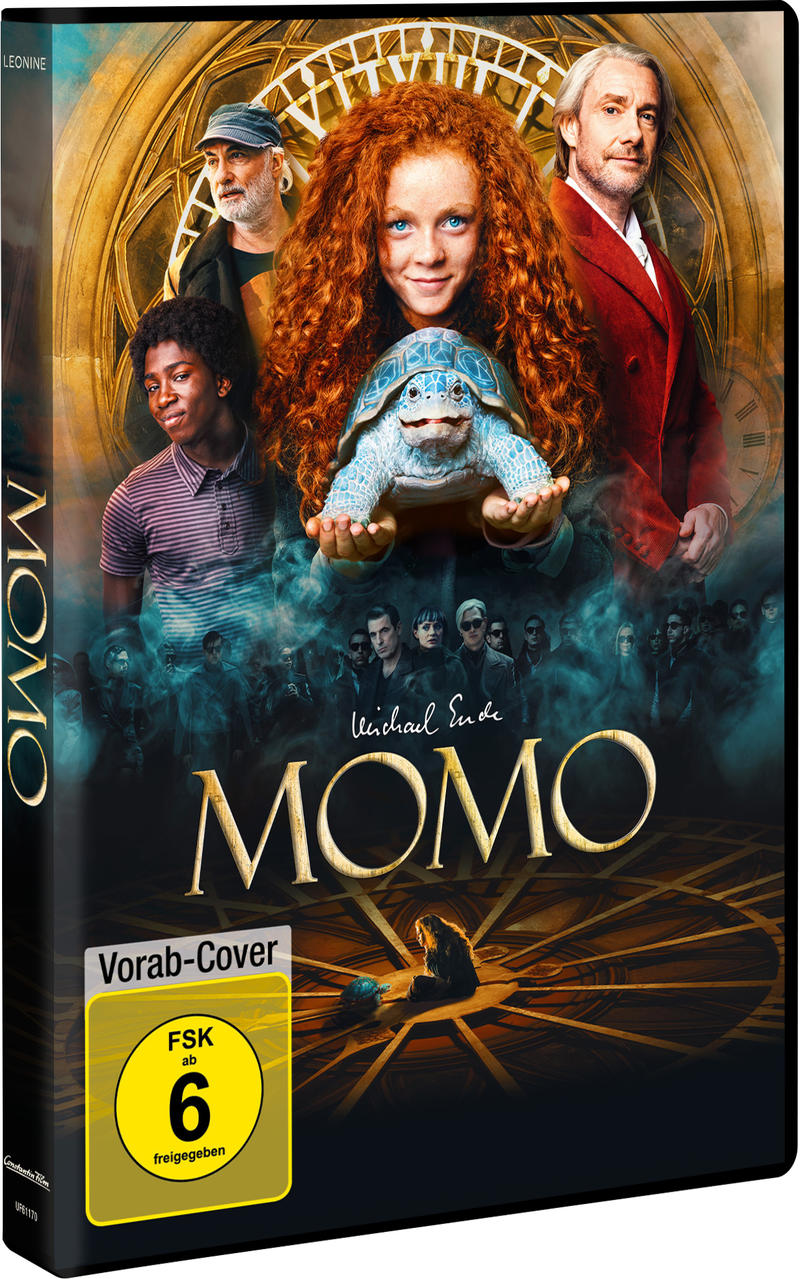 DVD-Cover für 'Momo'. Ein Mädchen mit roten Haaren hält eine blaue Schildkröte. Weitere Charaktere und der Titel 'MOMO' sind zu sehen.