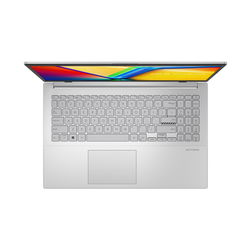 Top view of a silver ASUS Vivobook laptop. The screen displays a colorful image. The keyboard and touchpad are visible.