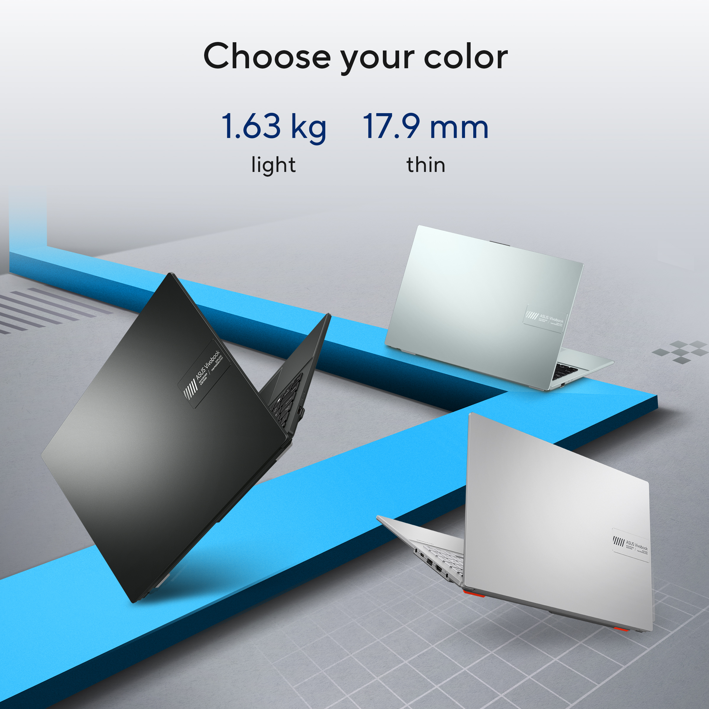 Image shows three laptops in different colors. Text mentions weight and thickness. Background is blue and gray.